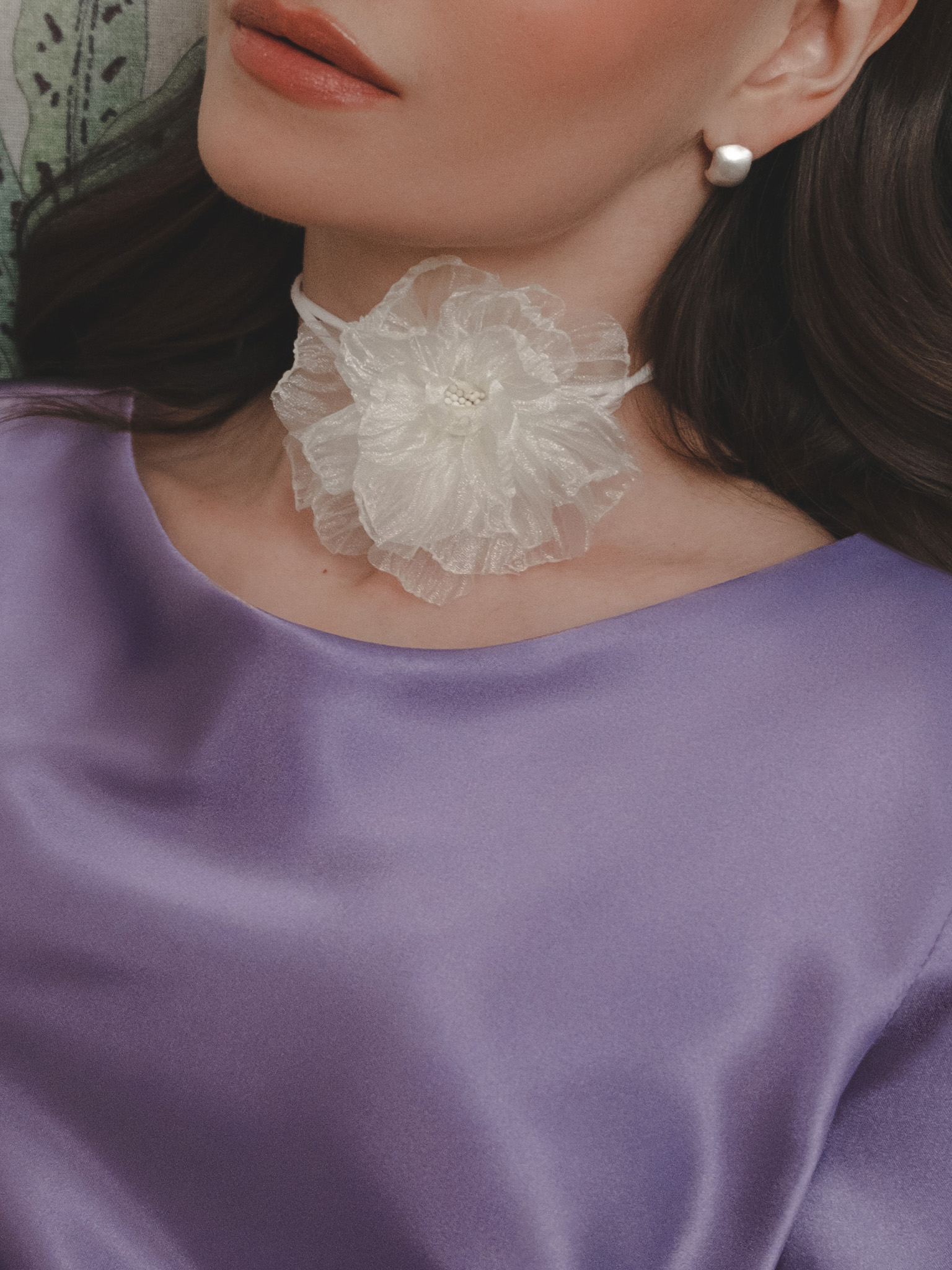 Lace necklace with a translucent flower