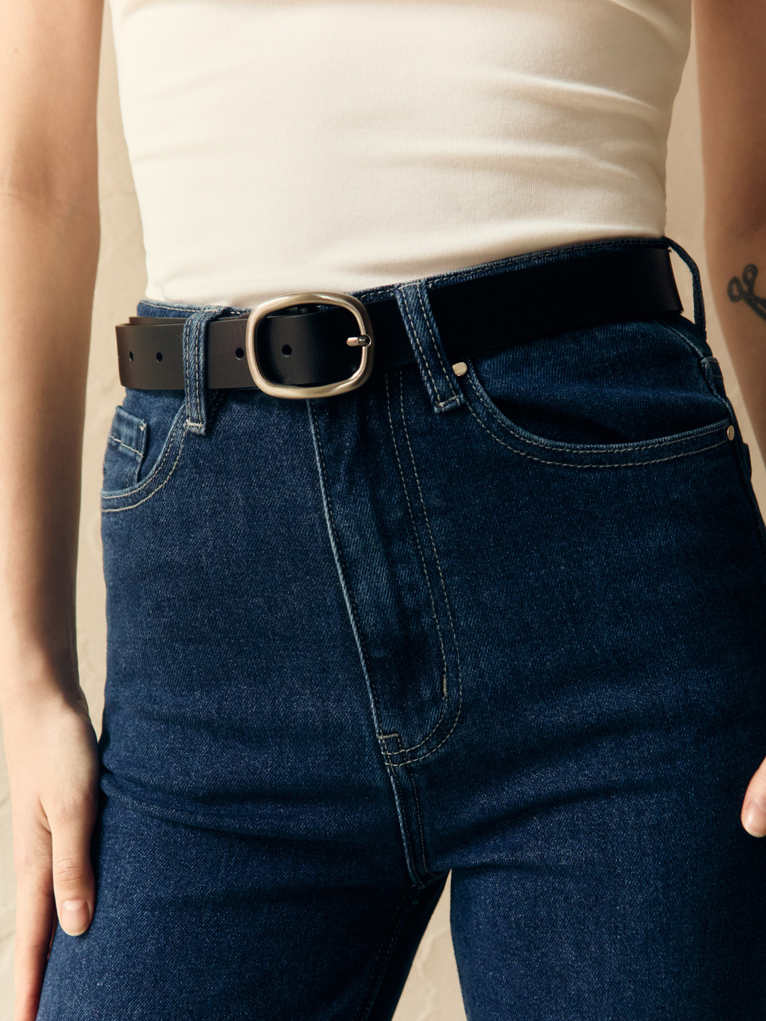 Wide leather belt with oval buckle