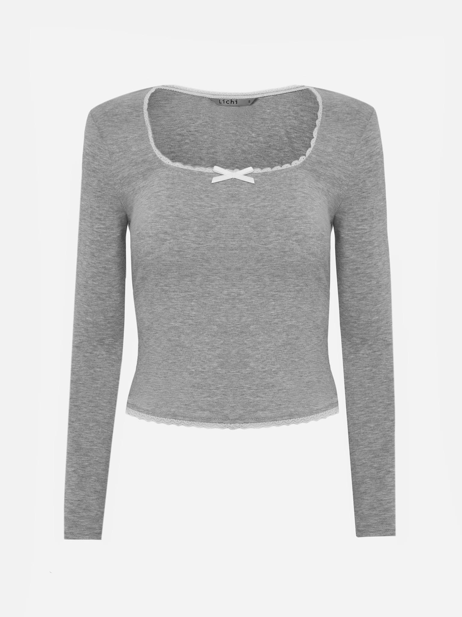 Jersey knitted longsleeve with openwork and bow on collar