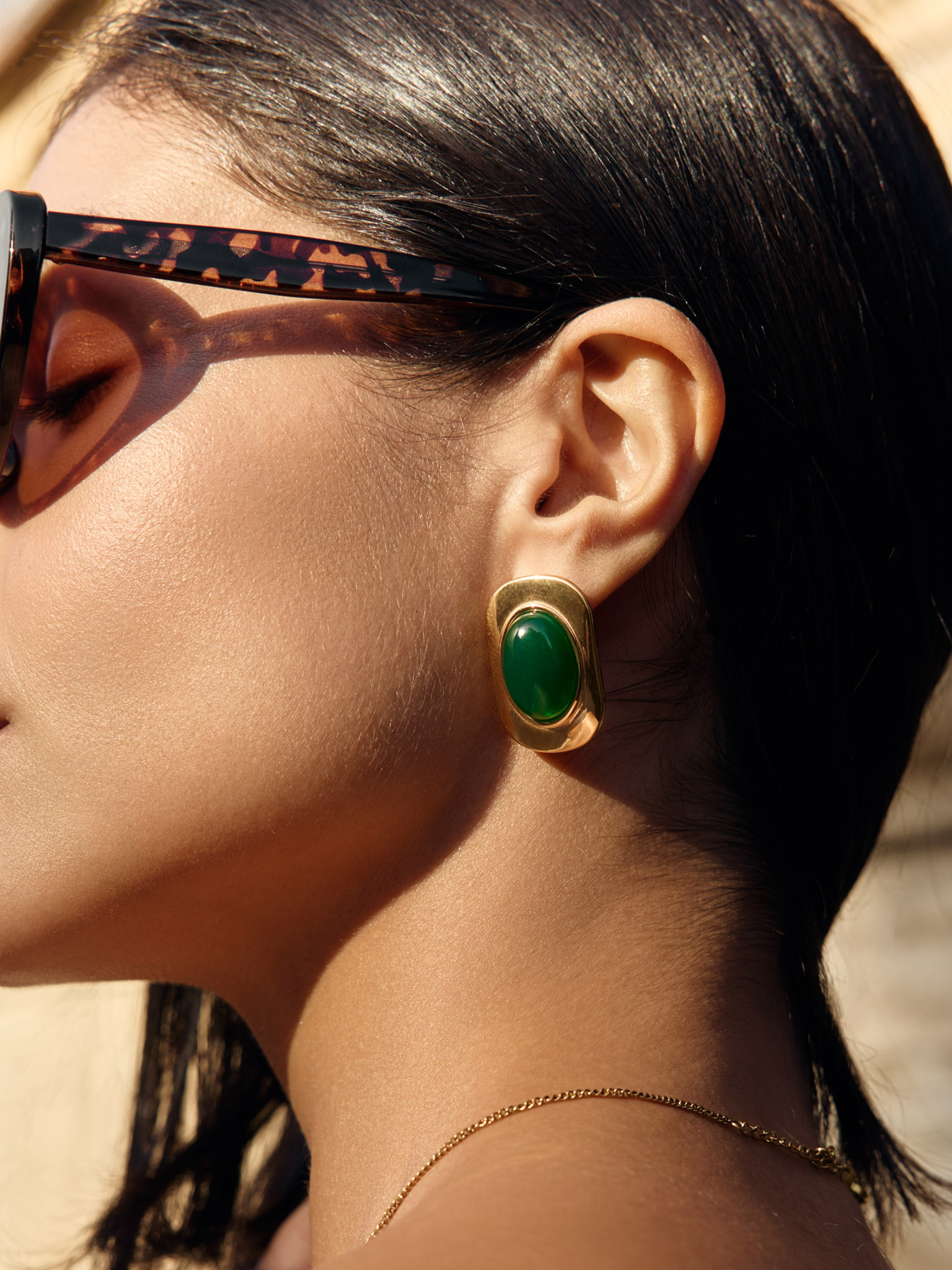 Large stud earrings with oval stones