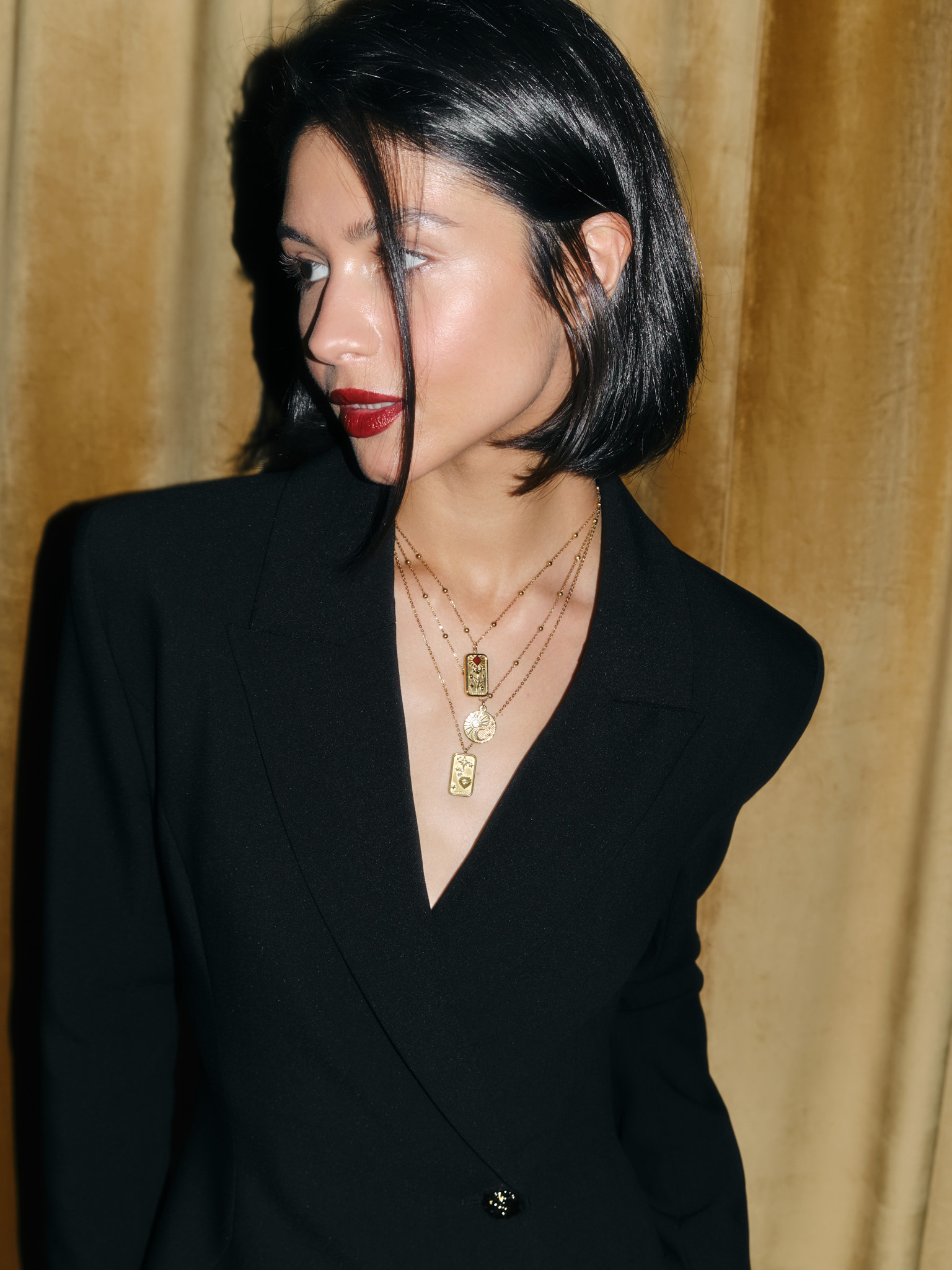 Set of three necklaces with large pendants