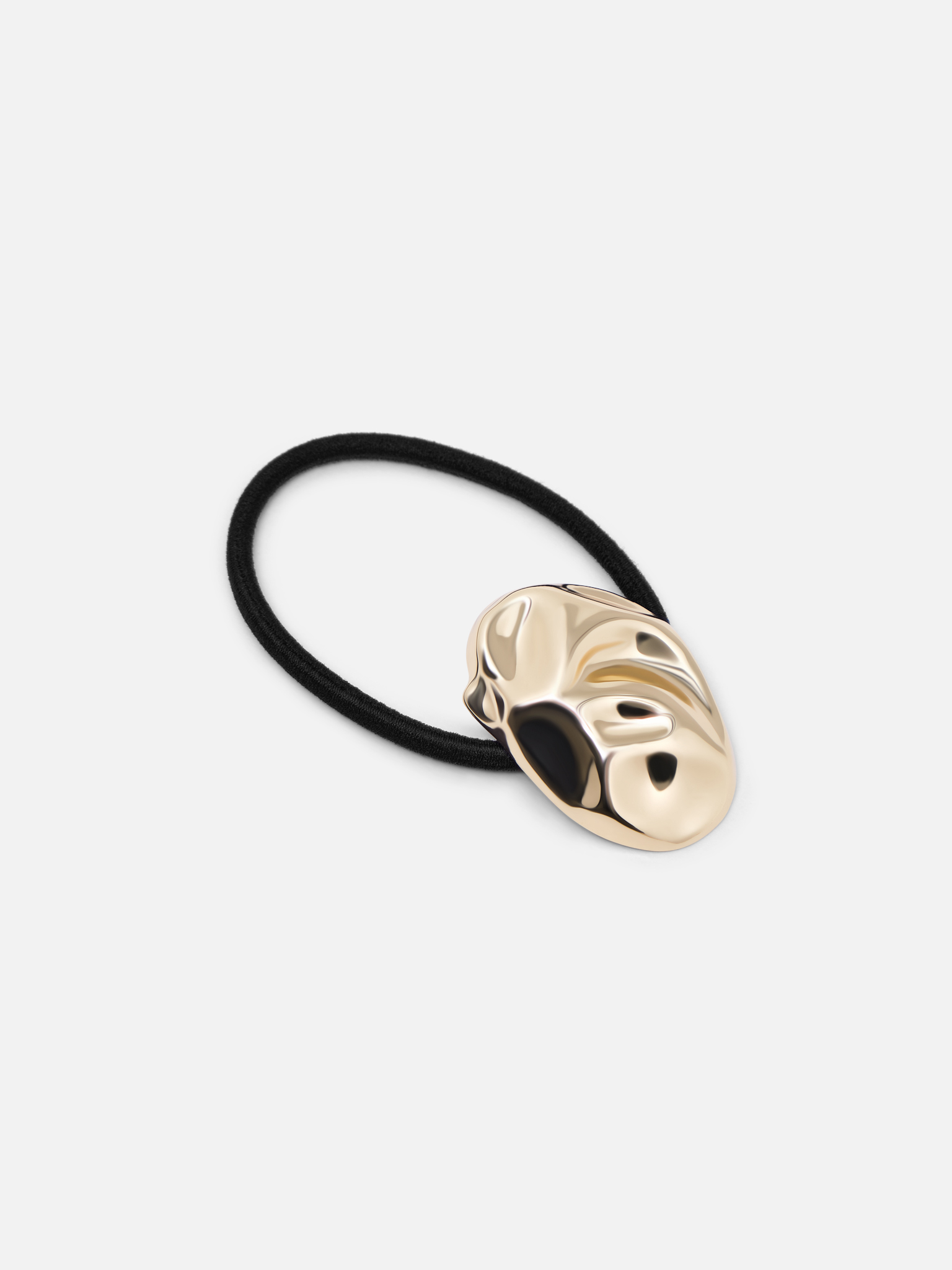 Scrunchie with metal decoration