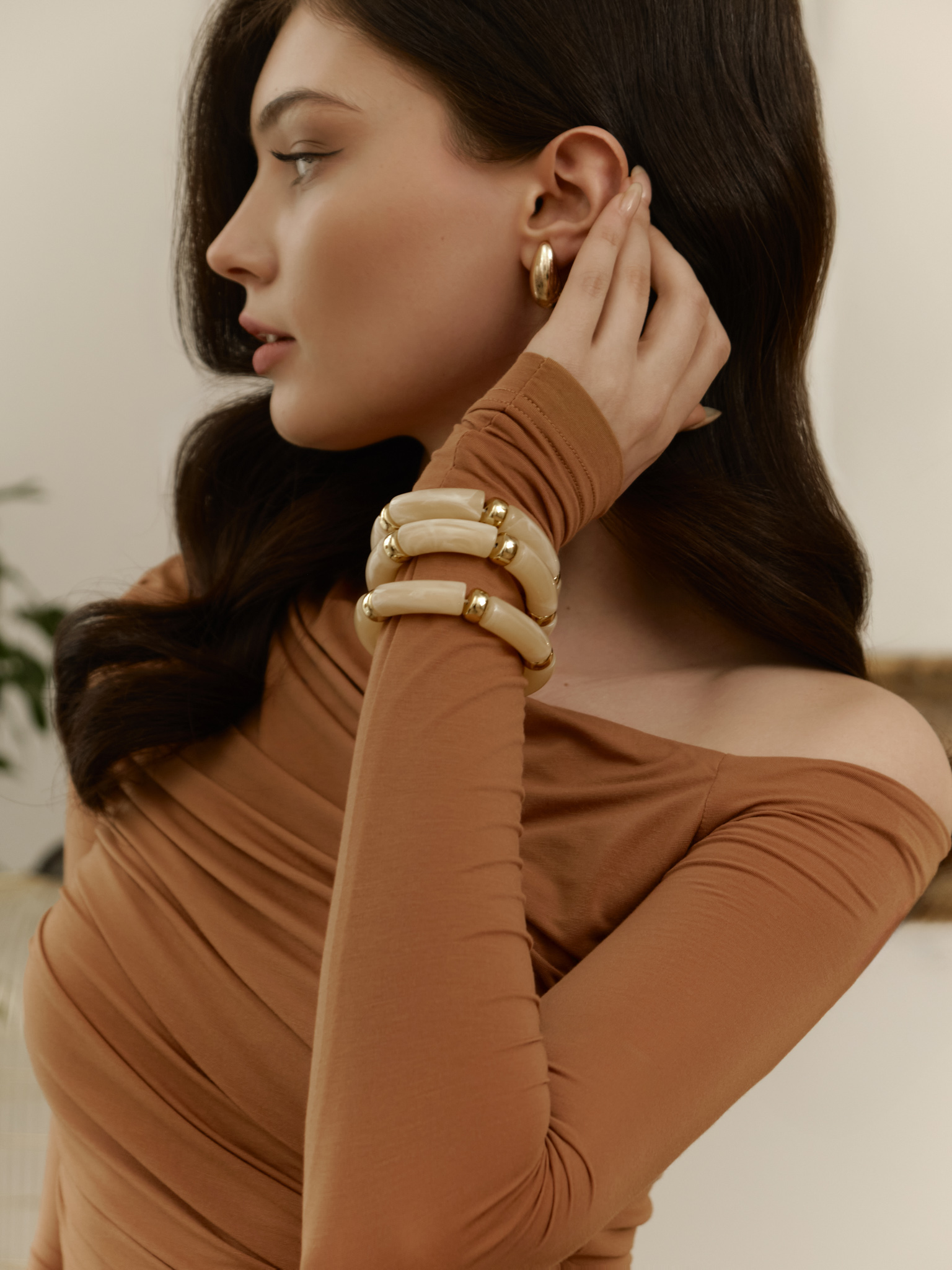 Set aus drei Armbändern mit goldfarbenen Einsätzen