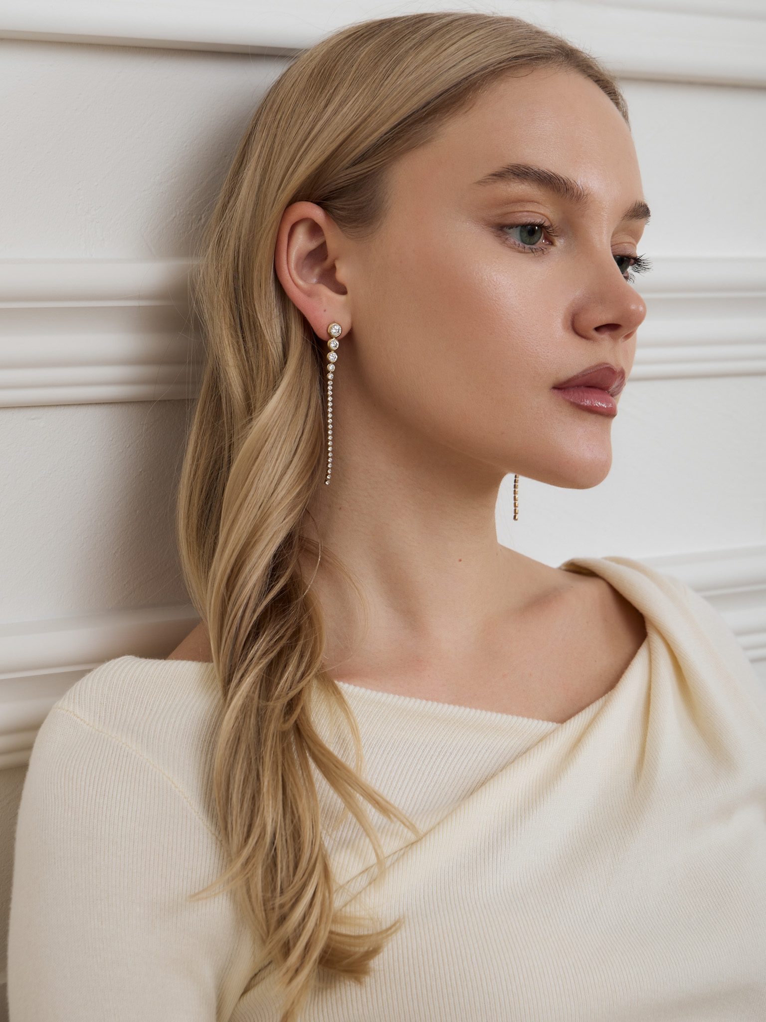 Long stud earrings with zircons