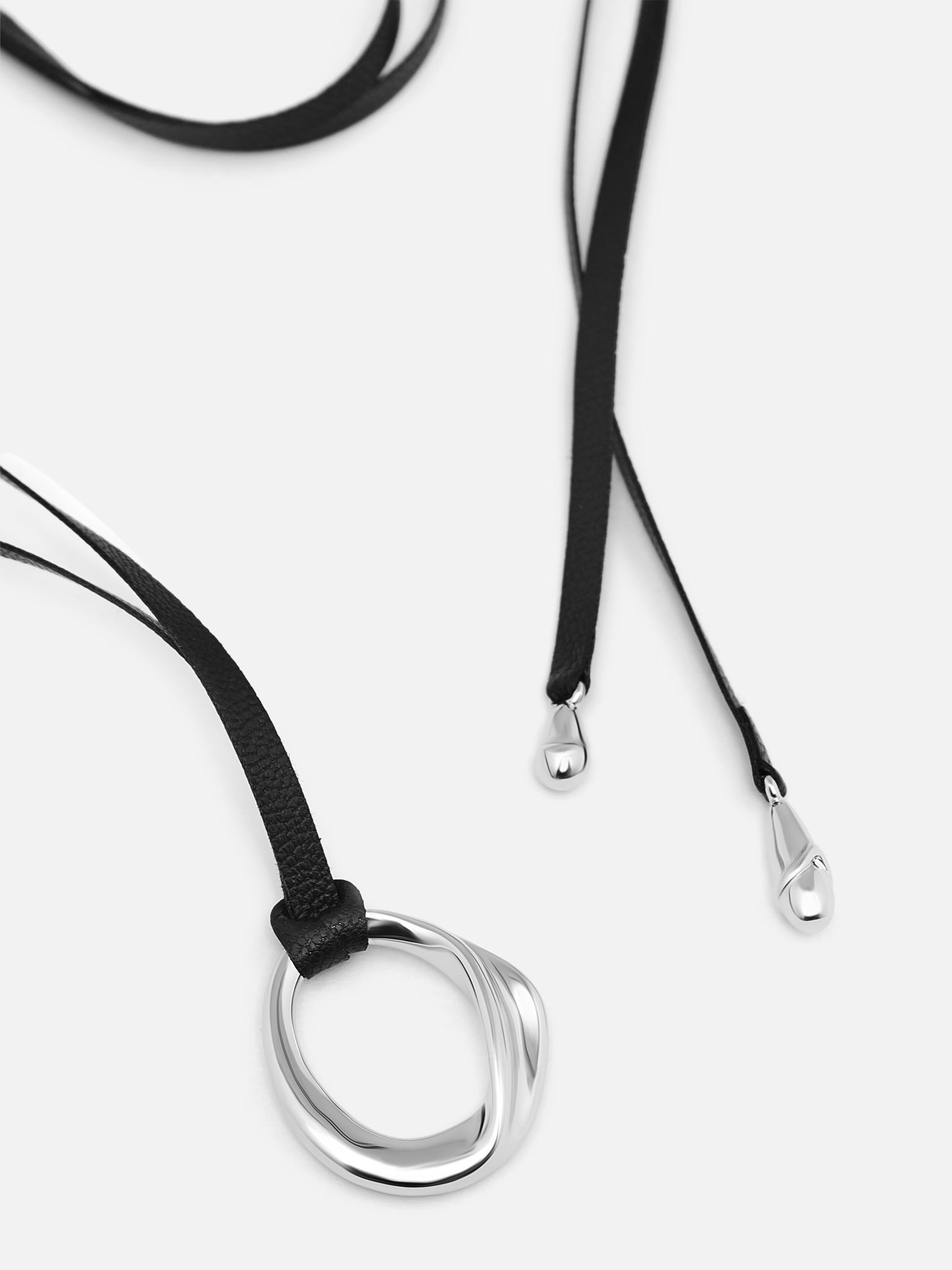 Lace necklace with metal pendant