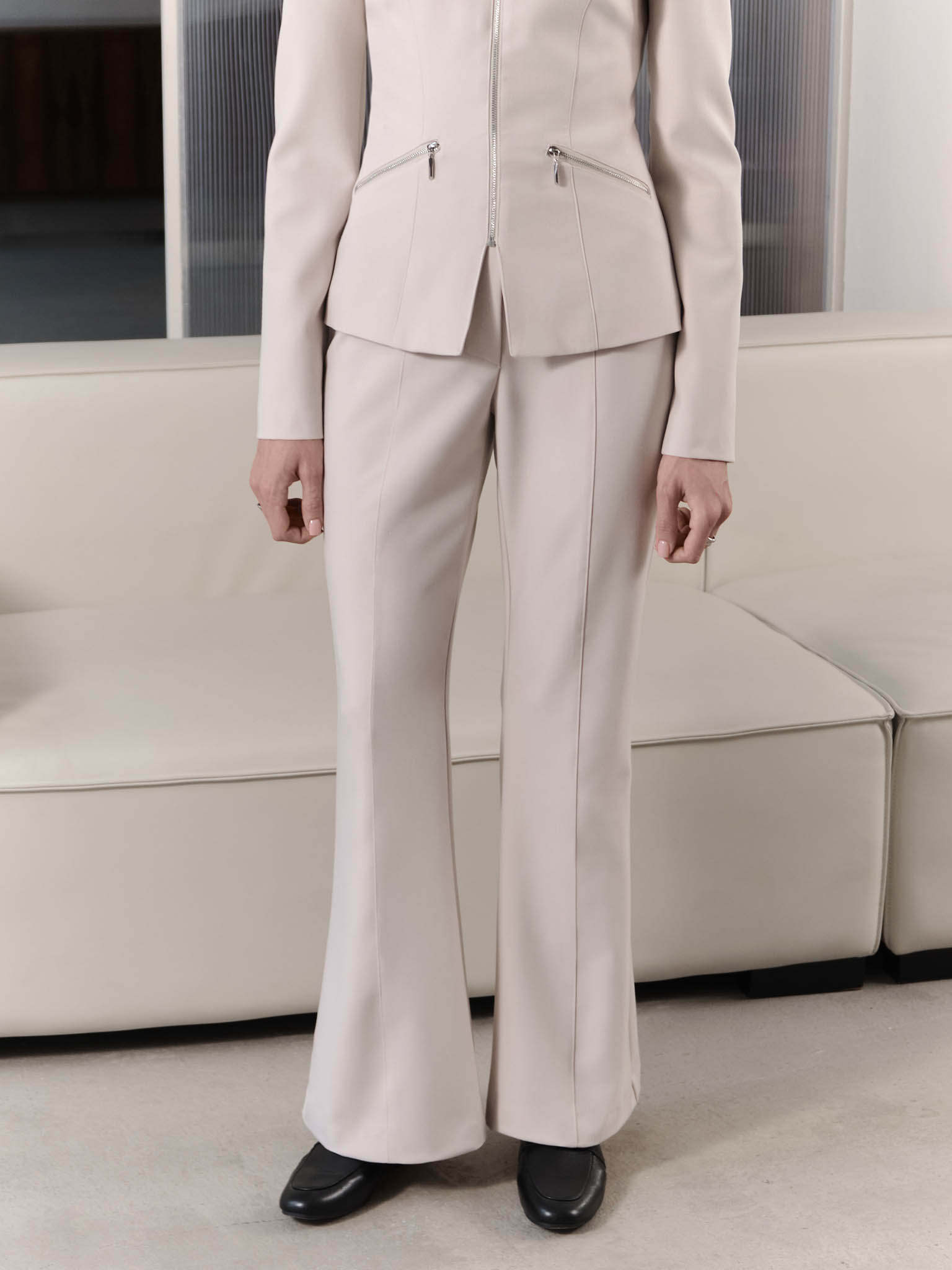 Flared trousers with a crease