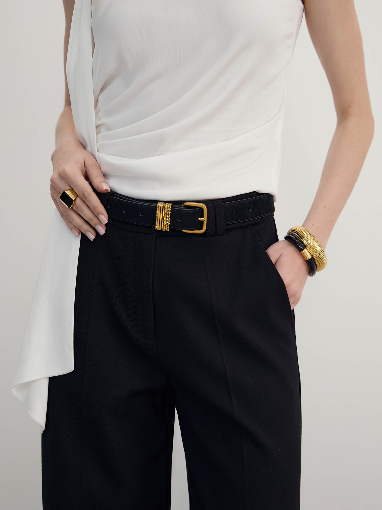 Wide belt with textured metal studs