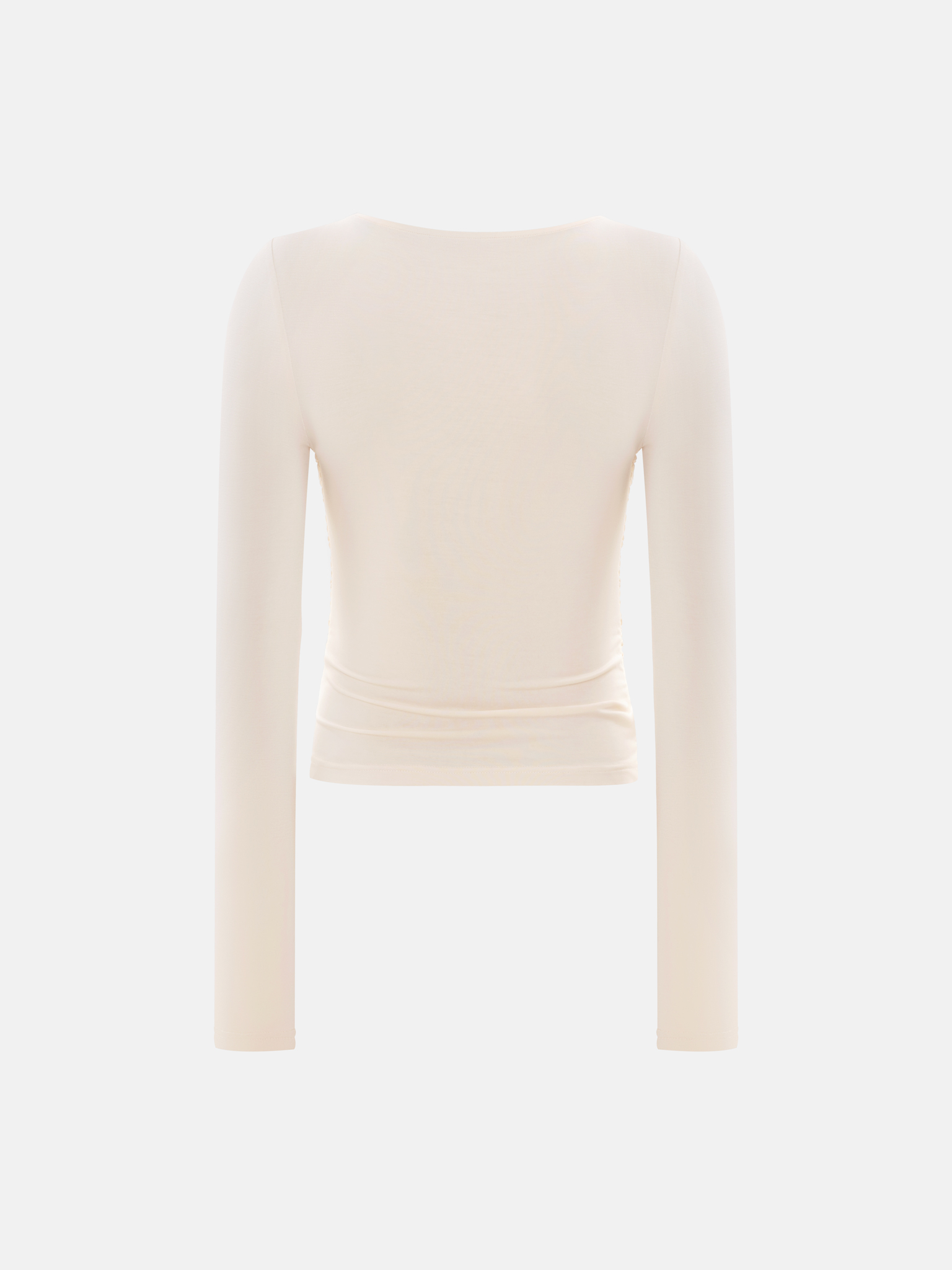 Трикотажный лонгслив с драпировкой на груди и сборками