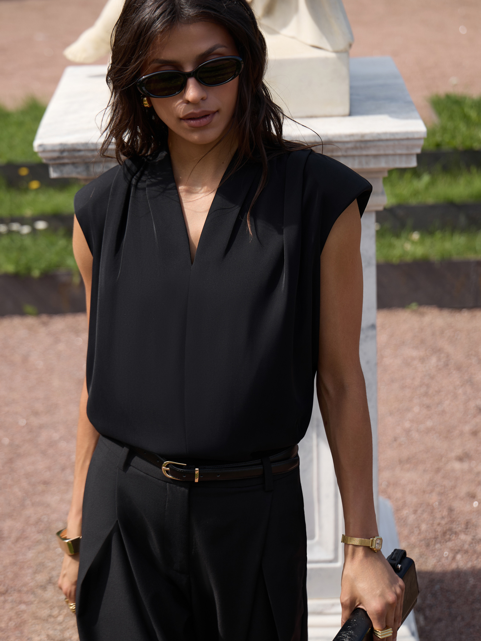 Blouse with voluminous shoulders and V-neckline