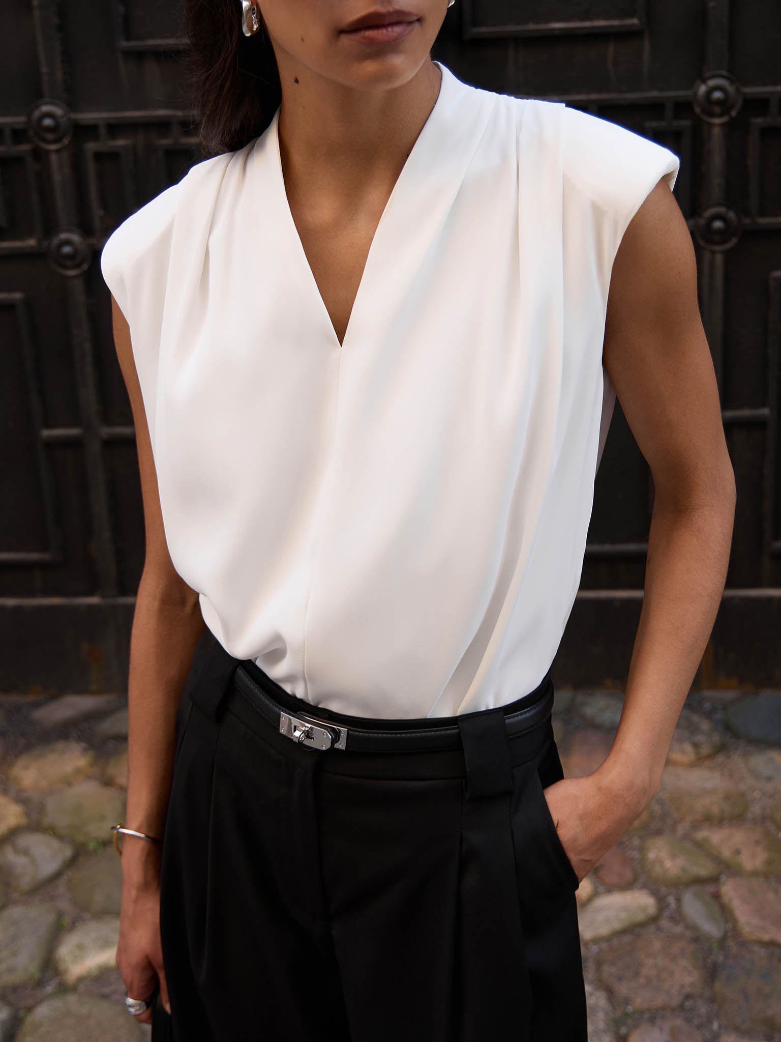 Blouse with voluminous shoulders and V-neckline