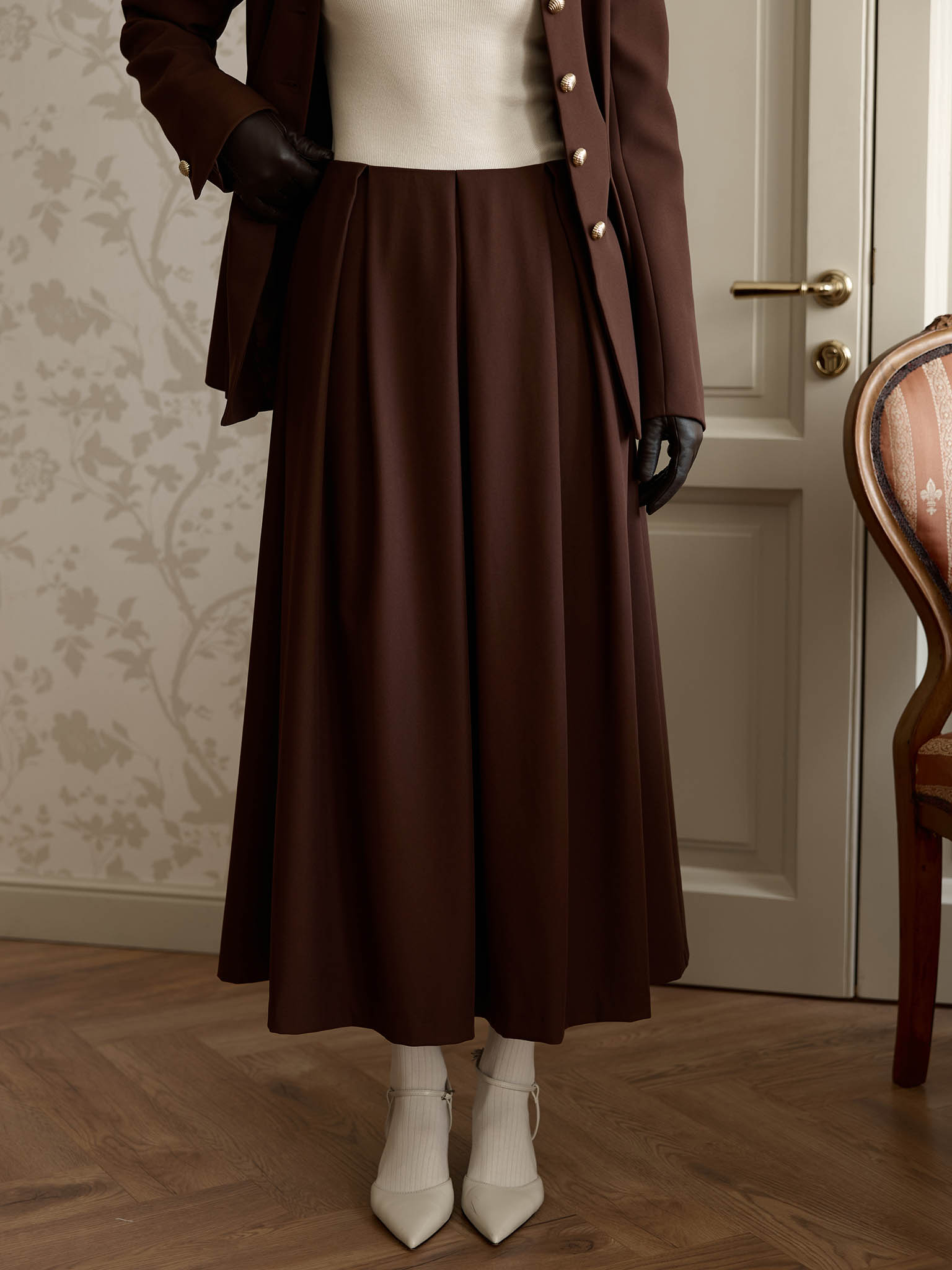 Flared midi skirt with waist pleats