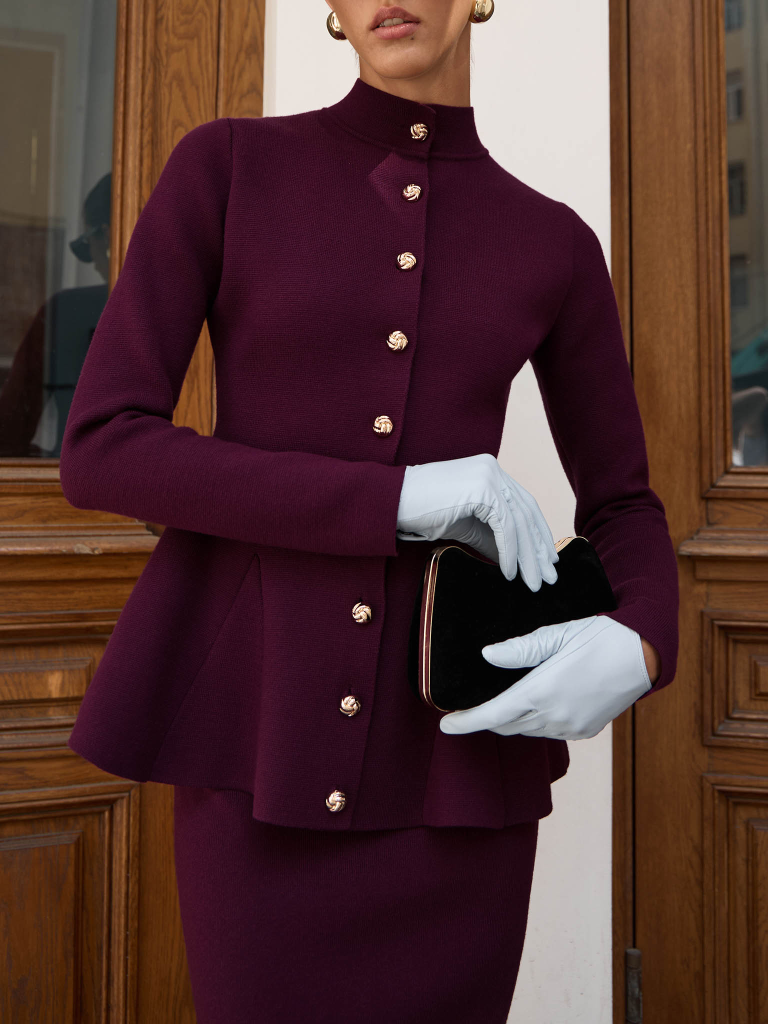 Jersey jacket with stand-up collar and golden buttons