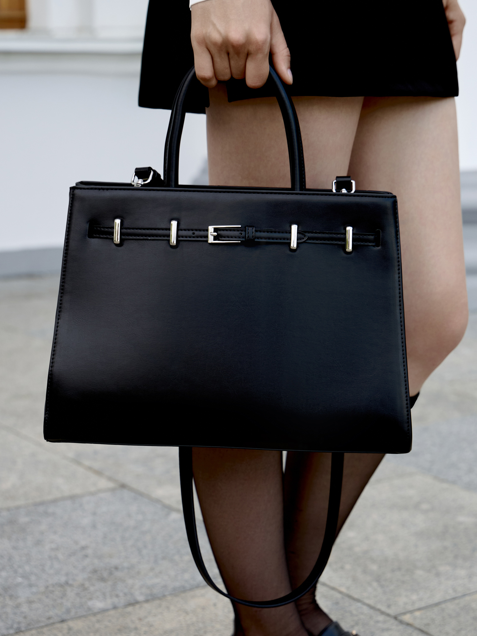 Rectangular bag with decorative strap