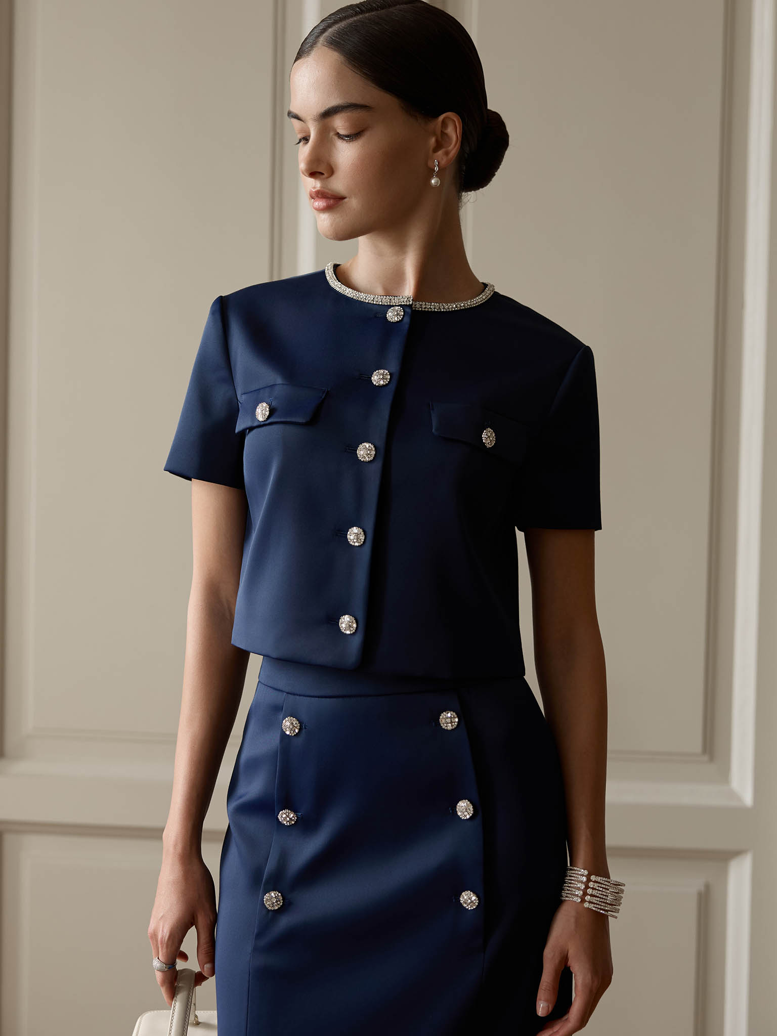 Short sleeved jacket with rhinestone buttons