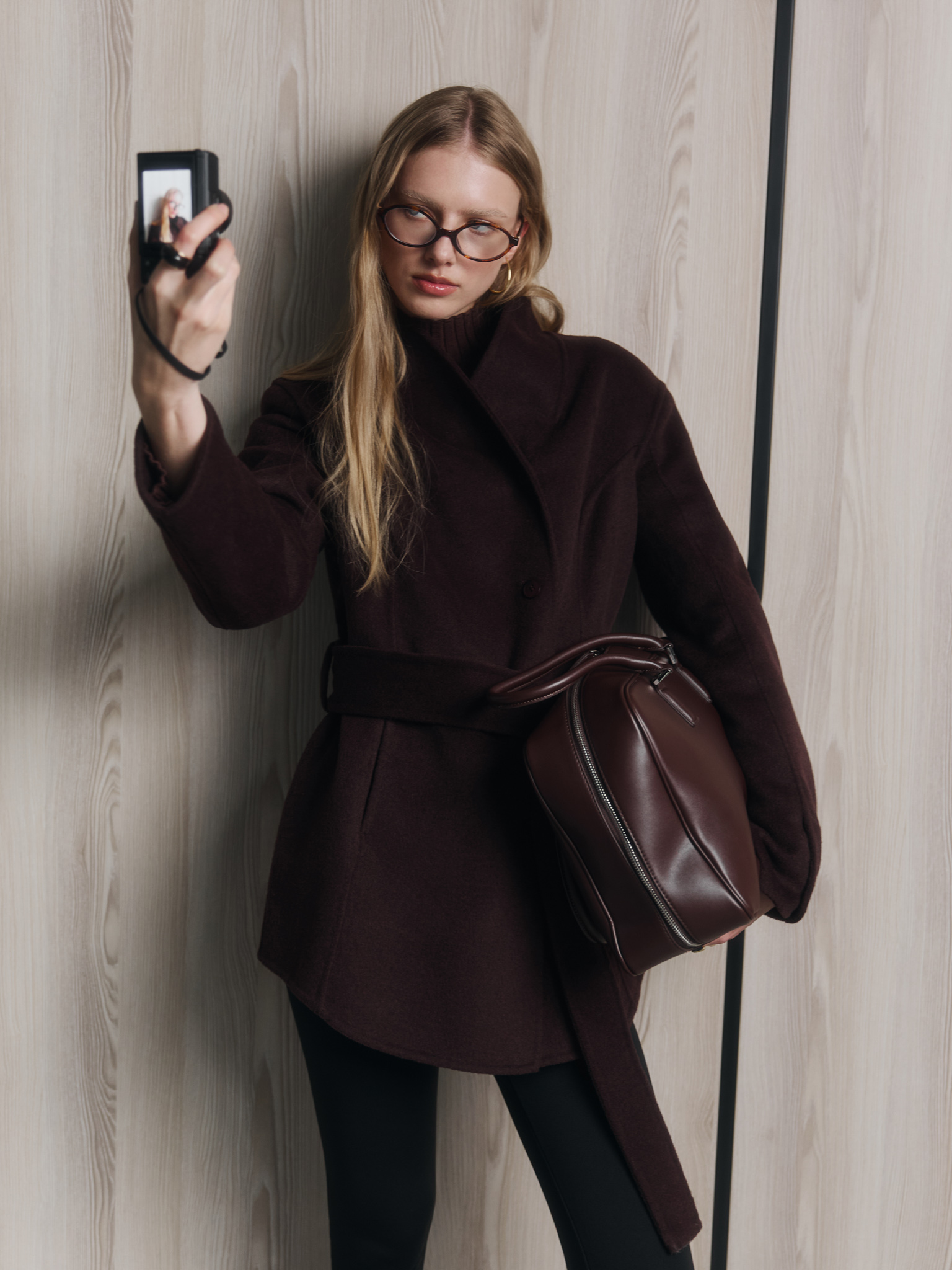 Cropped woollen coat with high collar and tonal buttons