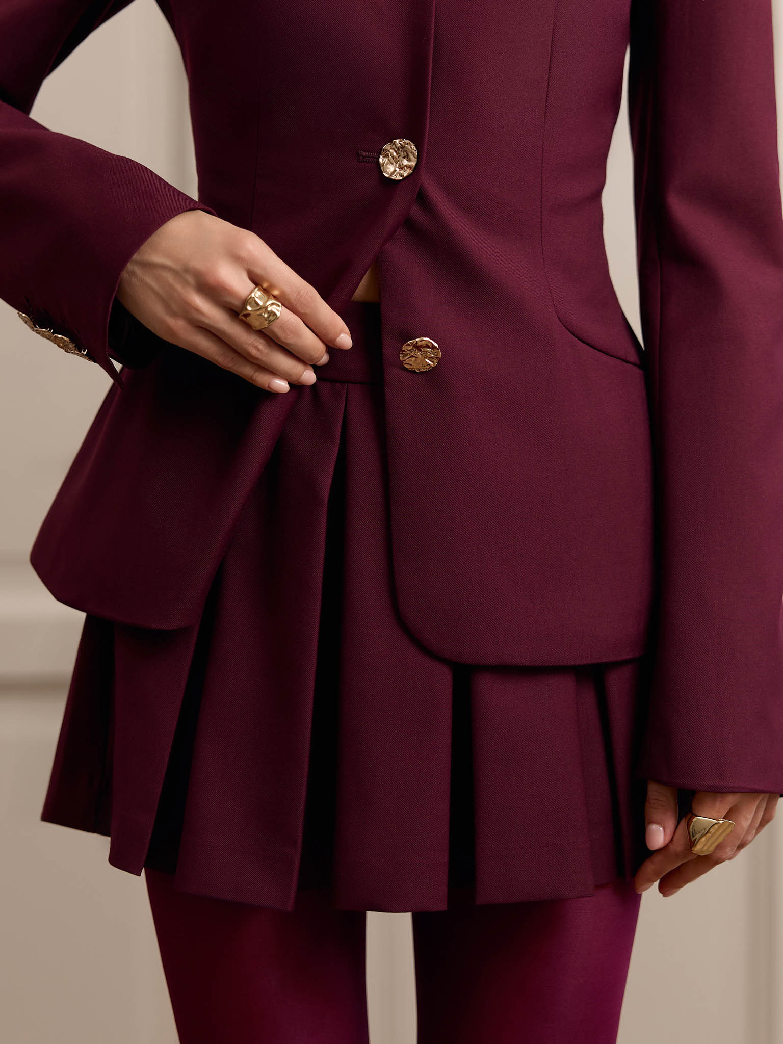 Mini skirt with waist pleats