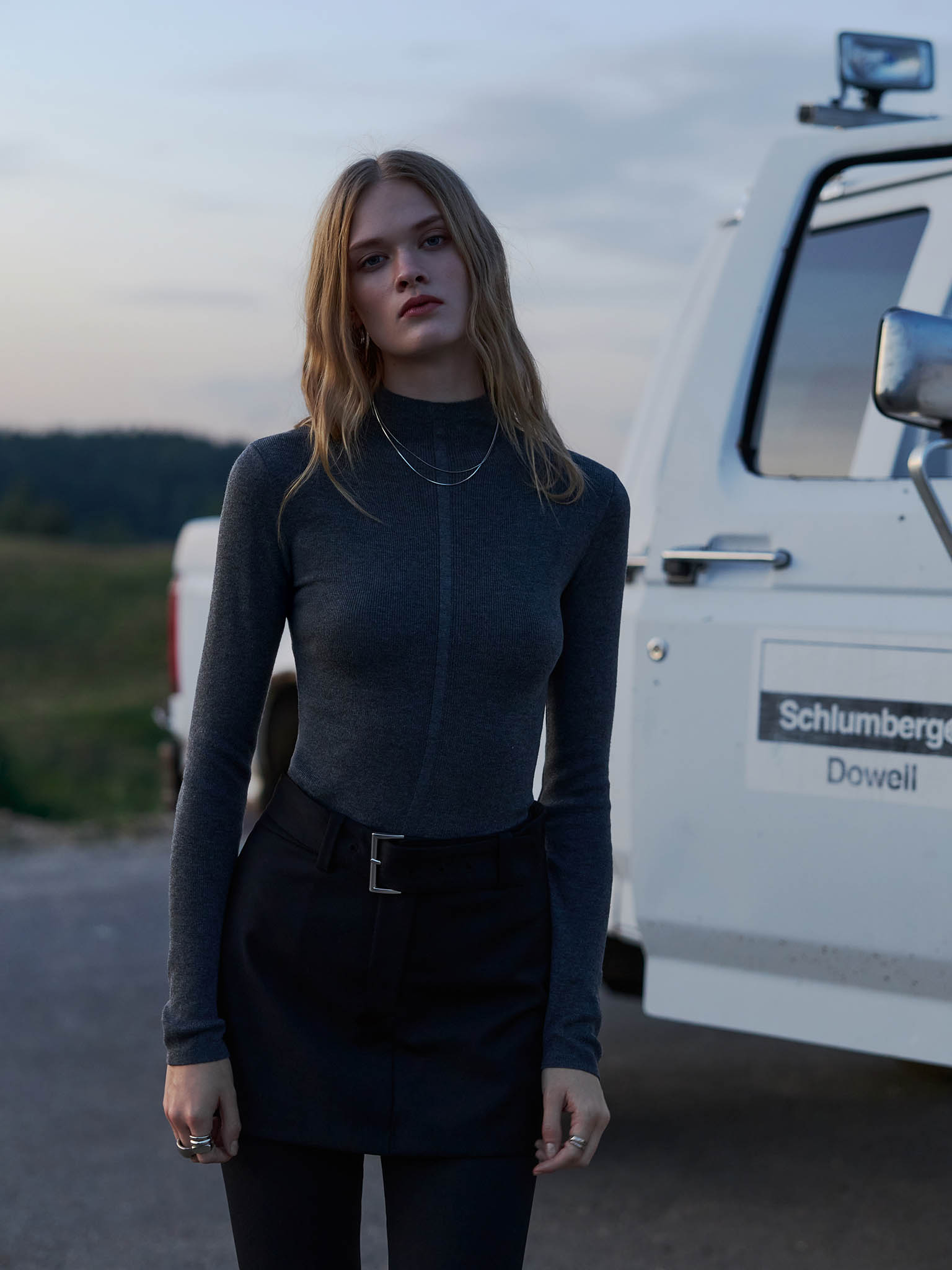 Ribbed turtleneck with a central decor