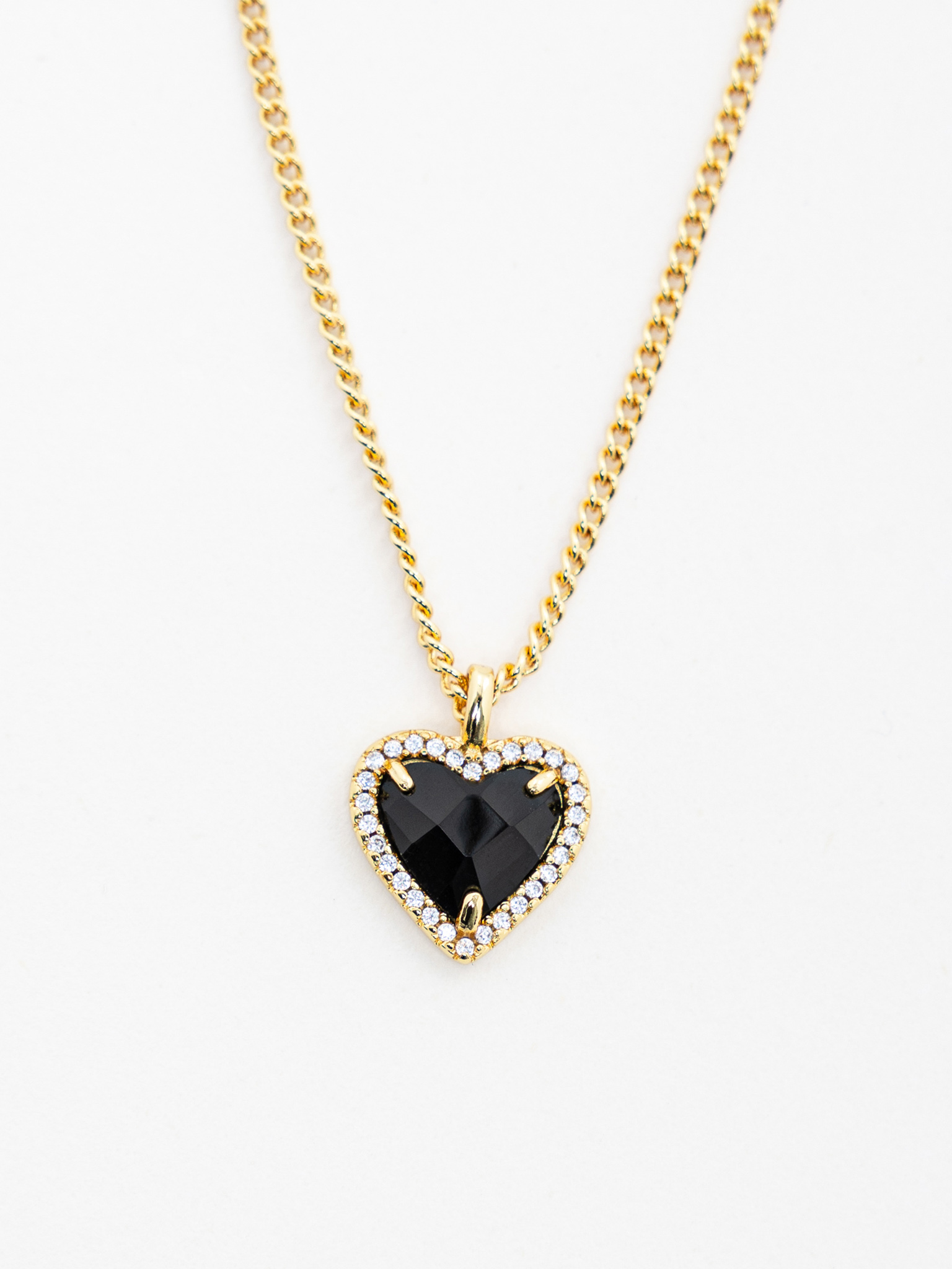 Golden chain with heart-shaped pendant