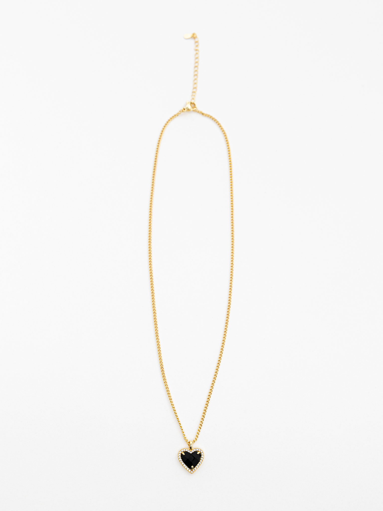 Golden chain with heart-shaped pendant