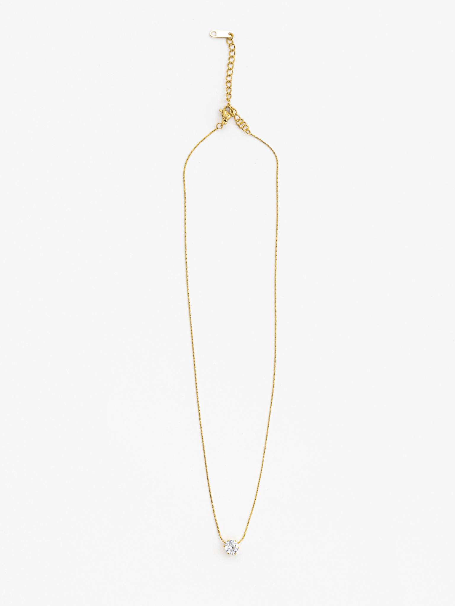 Тонкая цепь с подвеской в виде кристалла