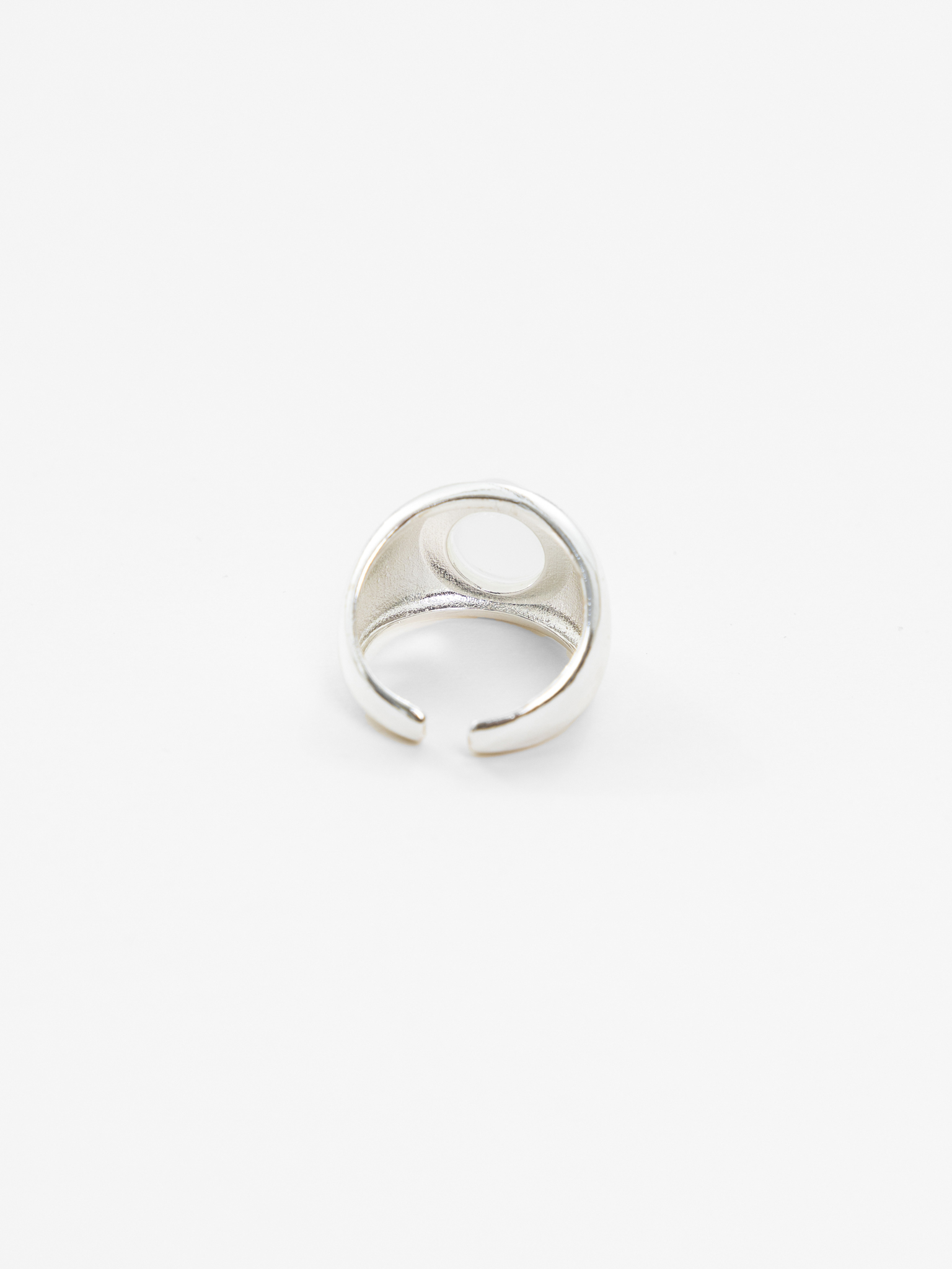 Silvertone ring with round crystal