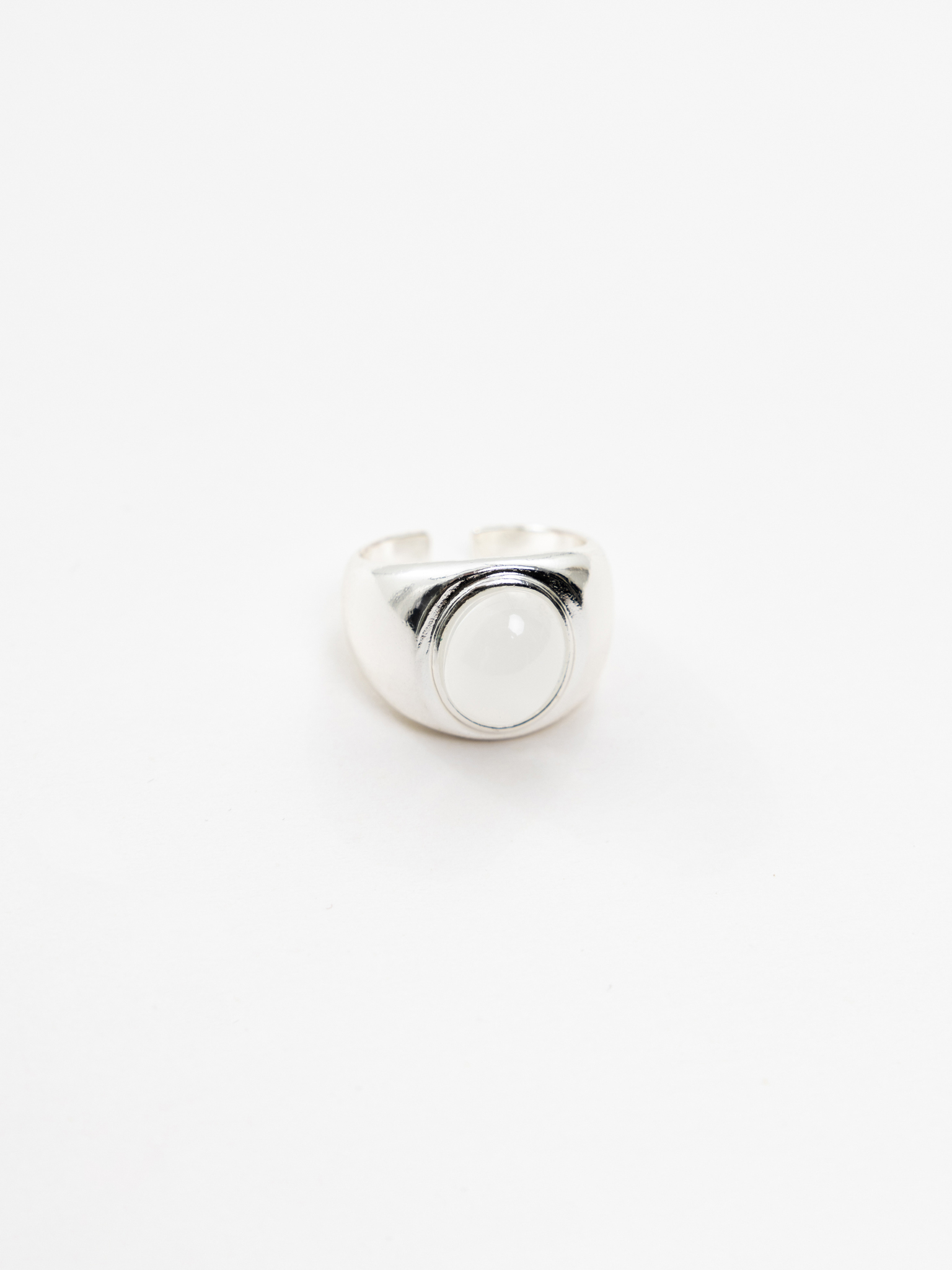 Silvertone ring with round crystal