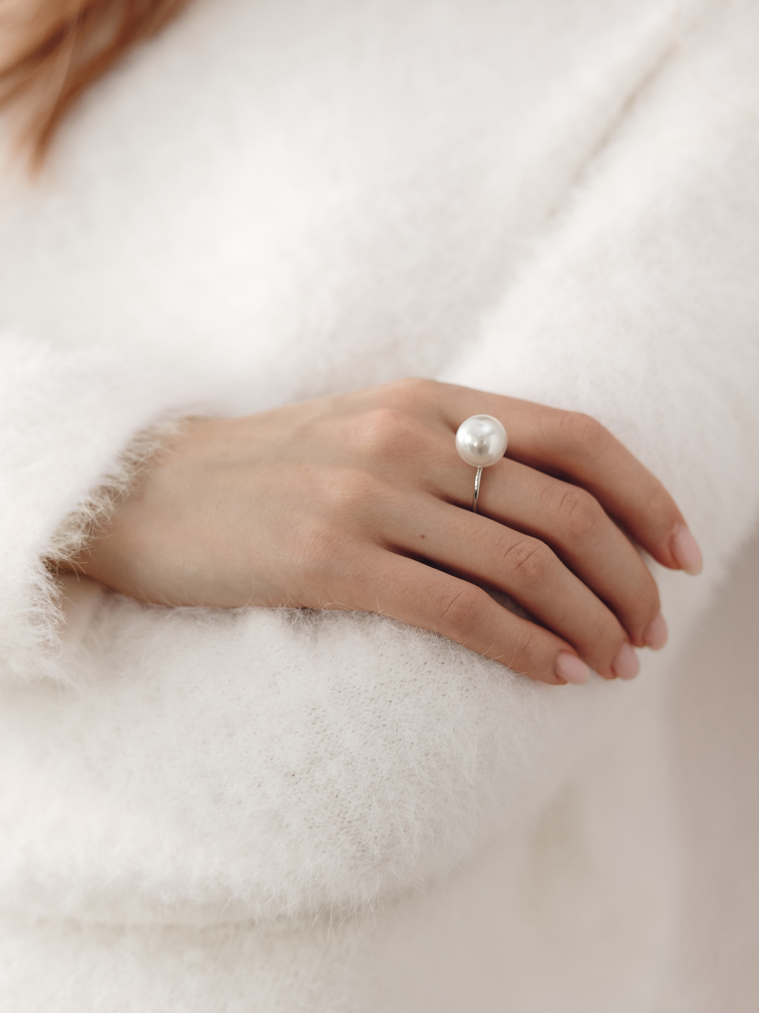 Thin ring with large pearl