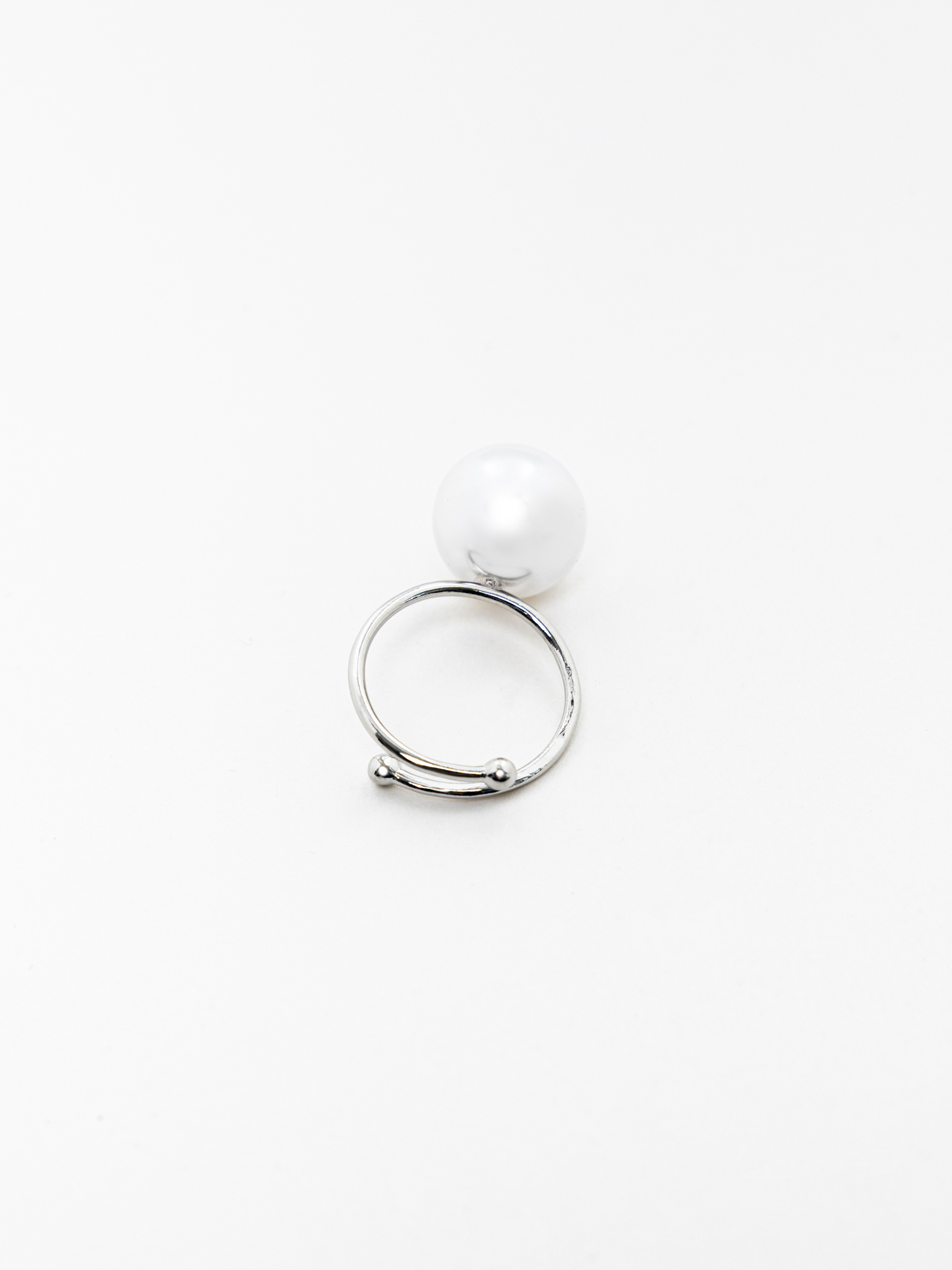 Thin ring with large pearl