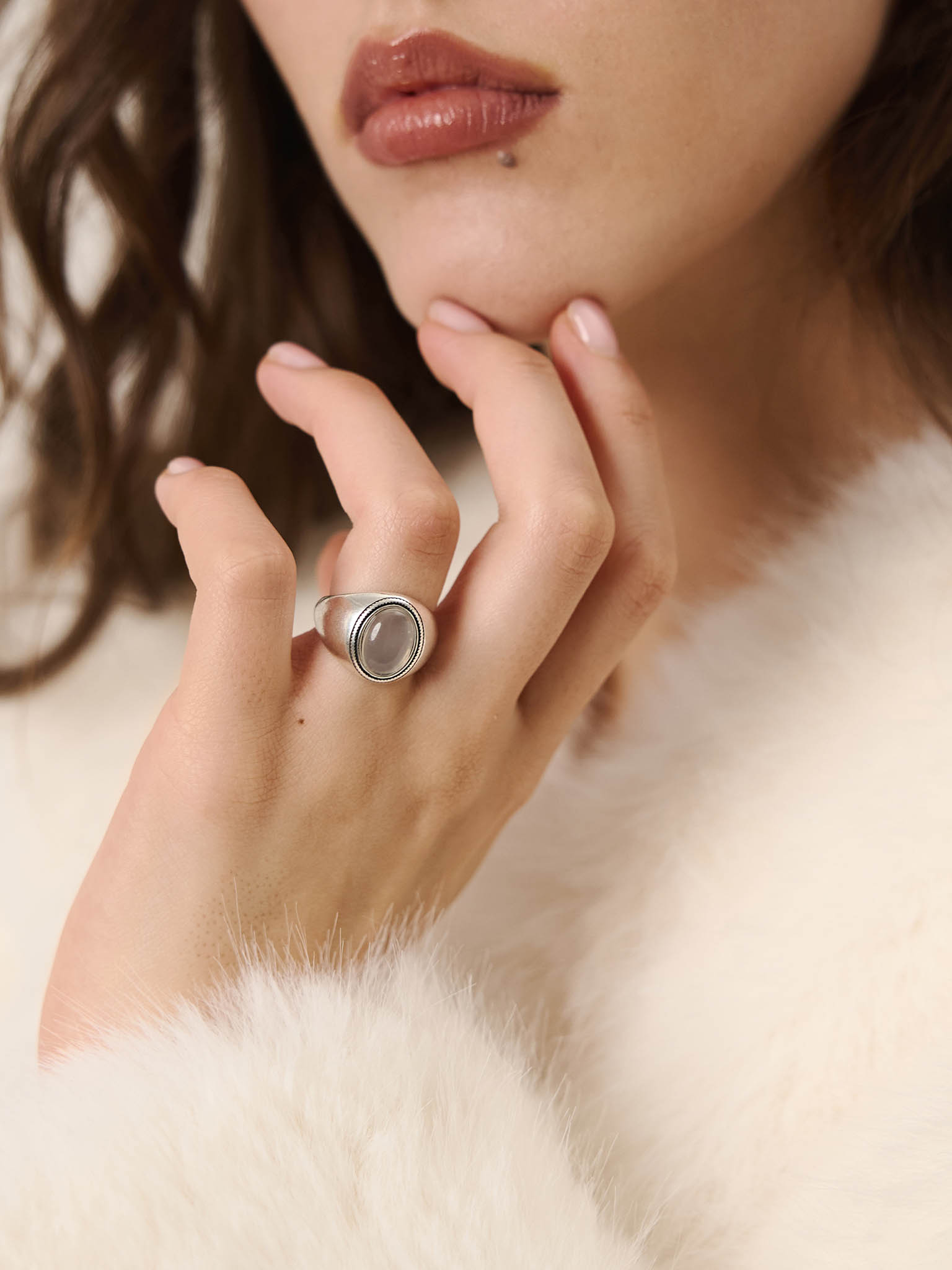 Silvertone ring with oval stone