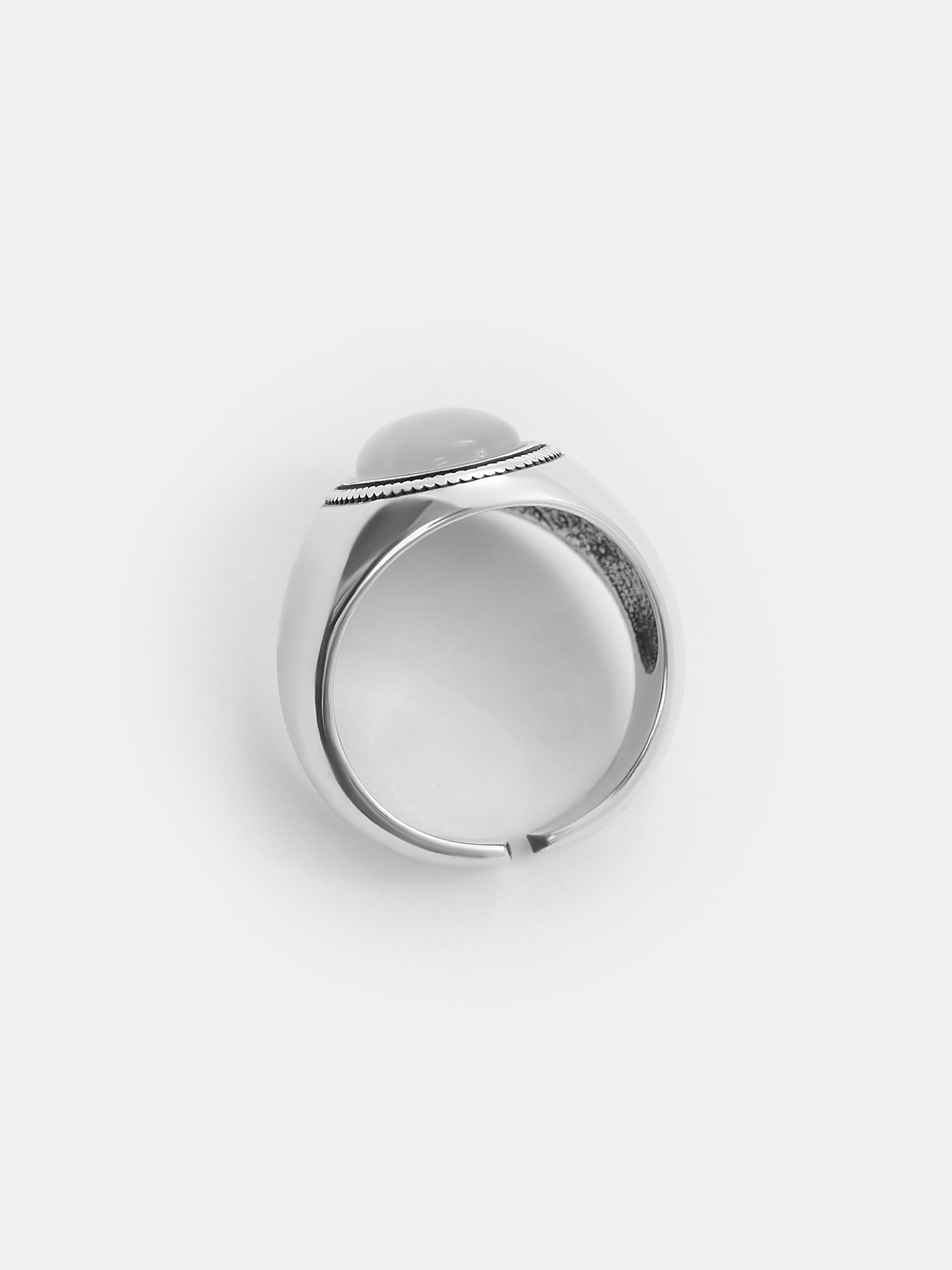 Silvertone ring with oval stone