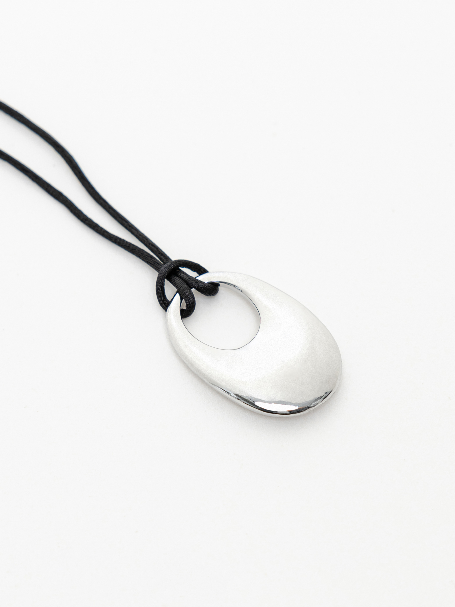 Lace necklace with metal pendant