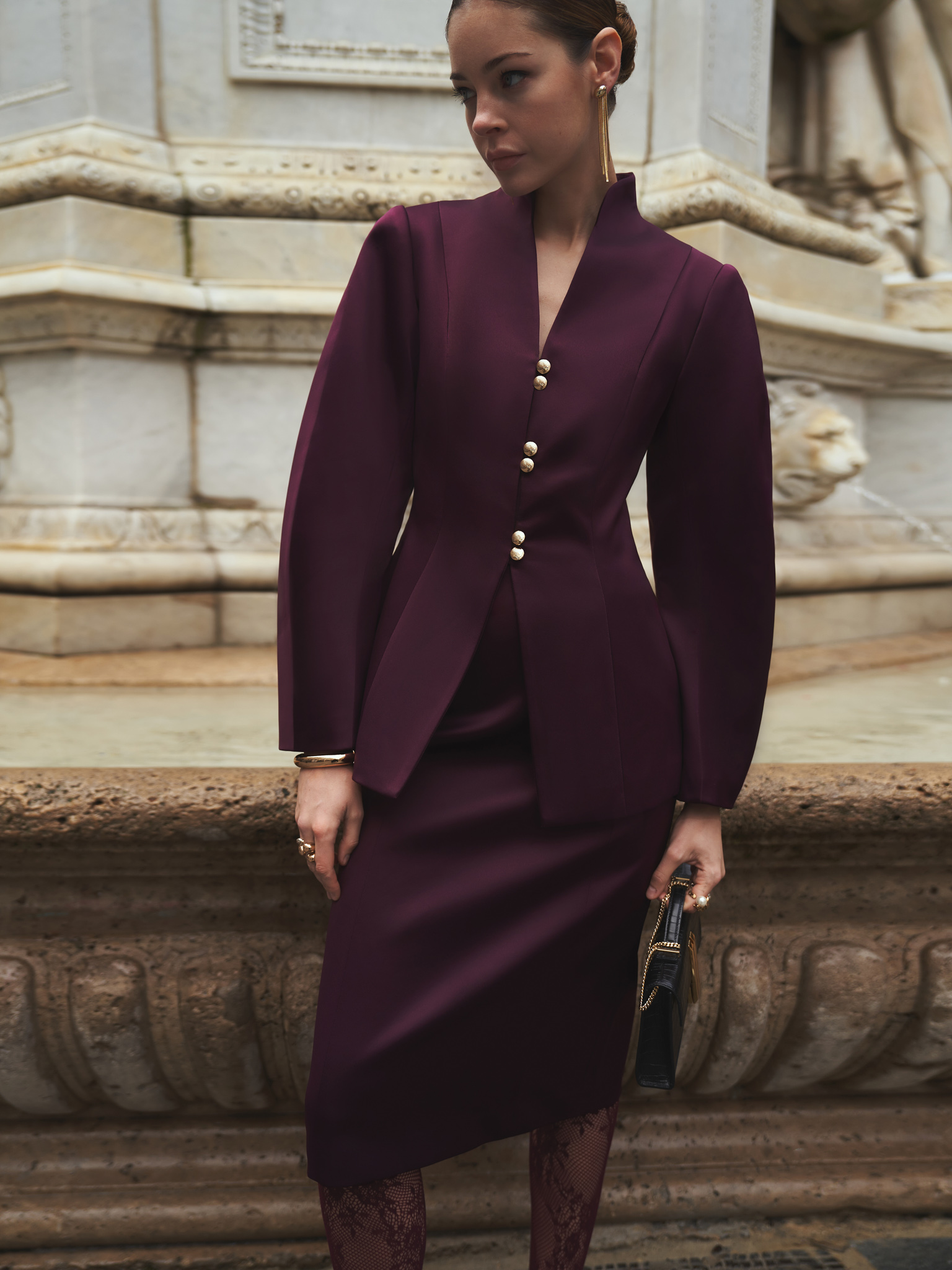 Fitted jacket with puff sleeves and gold buttons