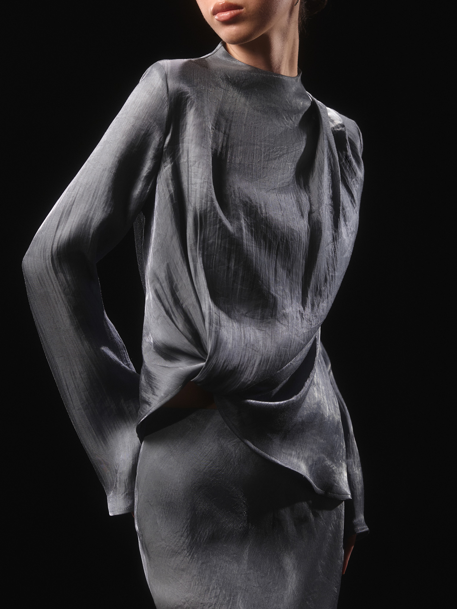 Asymmetrical blouse in shiny fabric