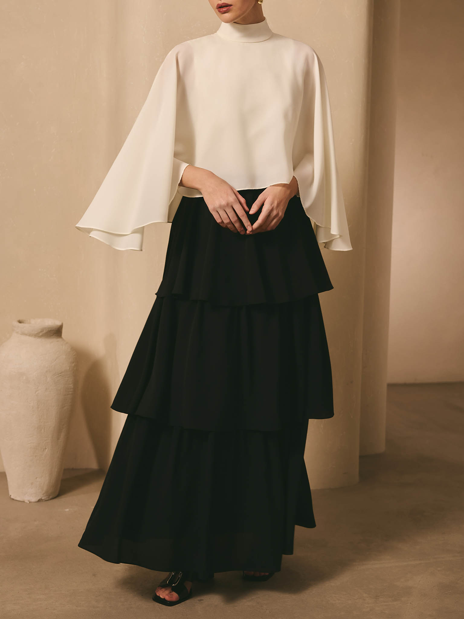 Maxi dress with contrasting cape and tiered skirt