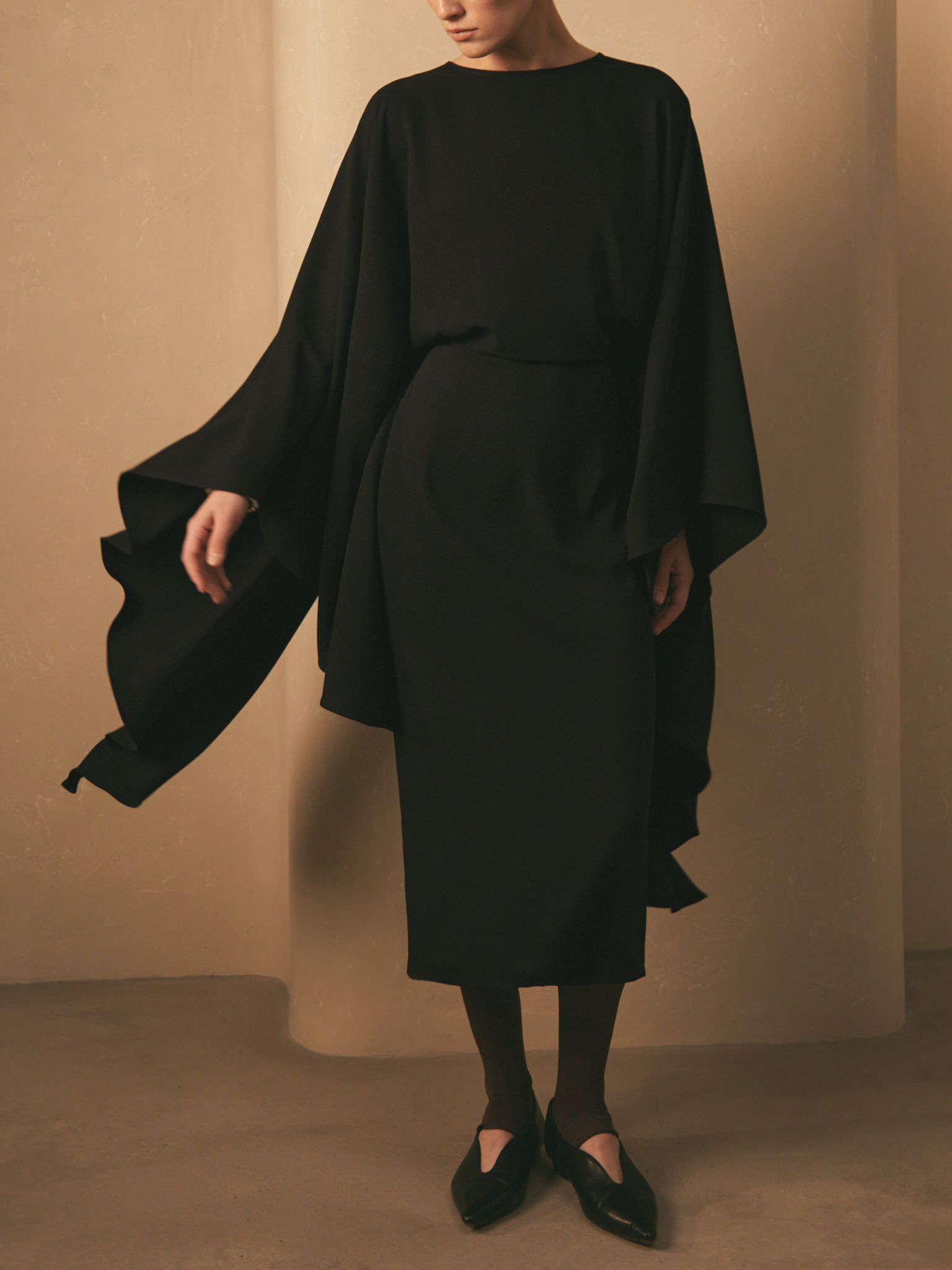 Midi dress with a long train and open back