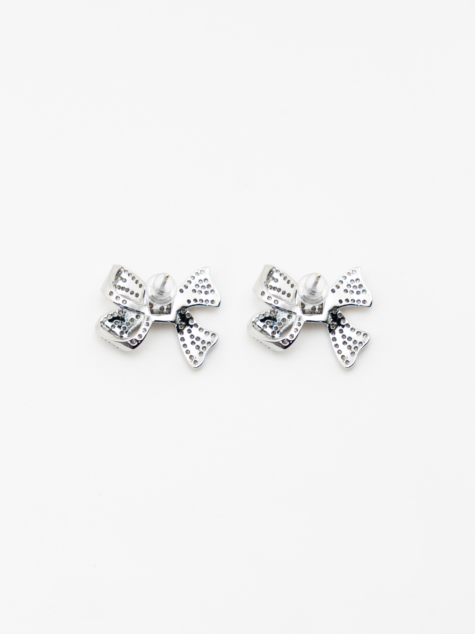 Earrings in the form of rhinestone bows