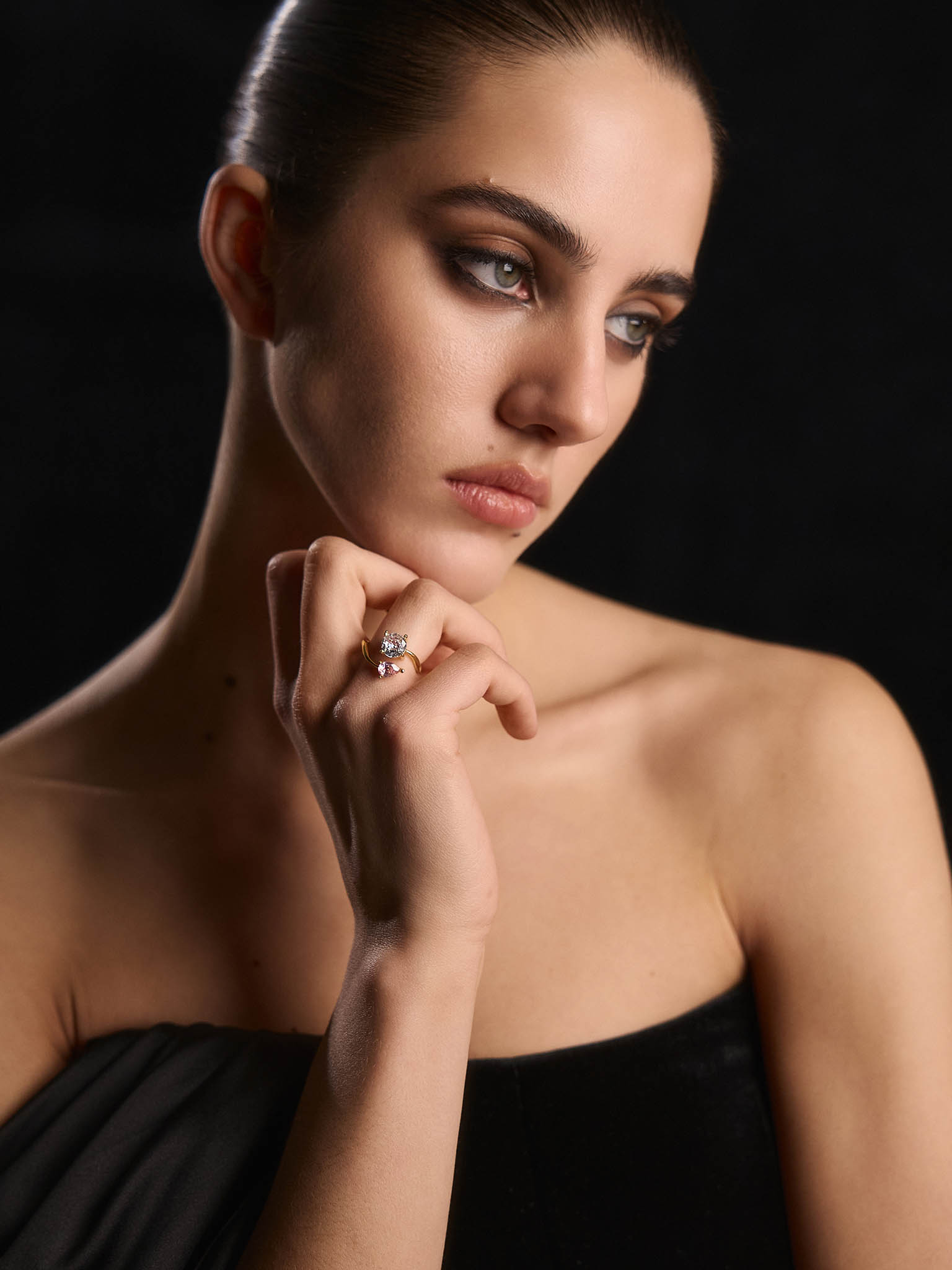 Asymmetrical ring with large stones