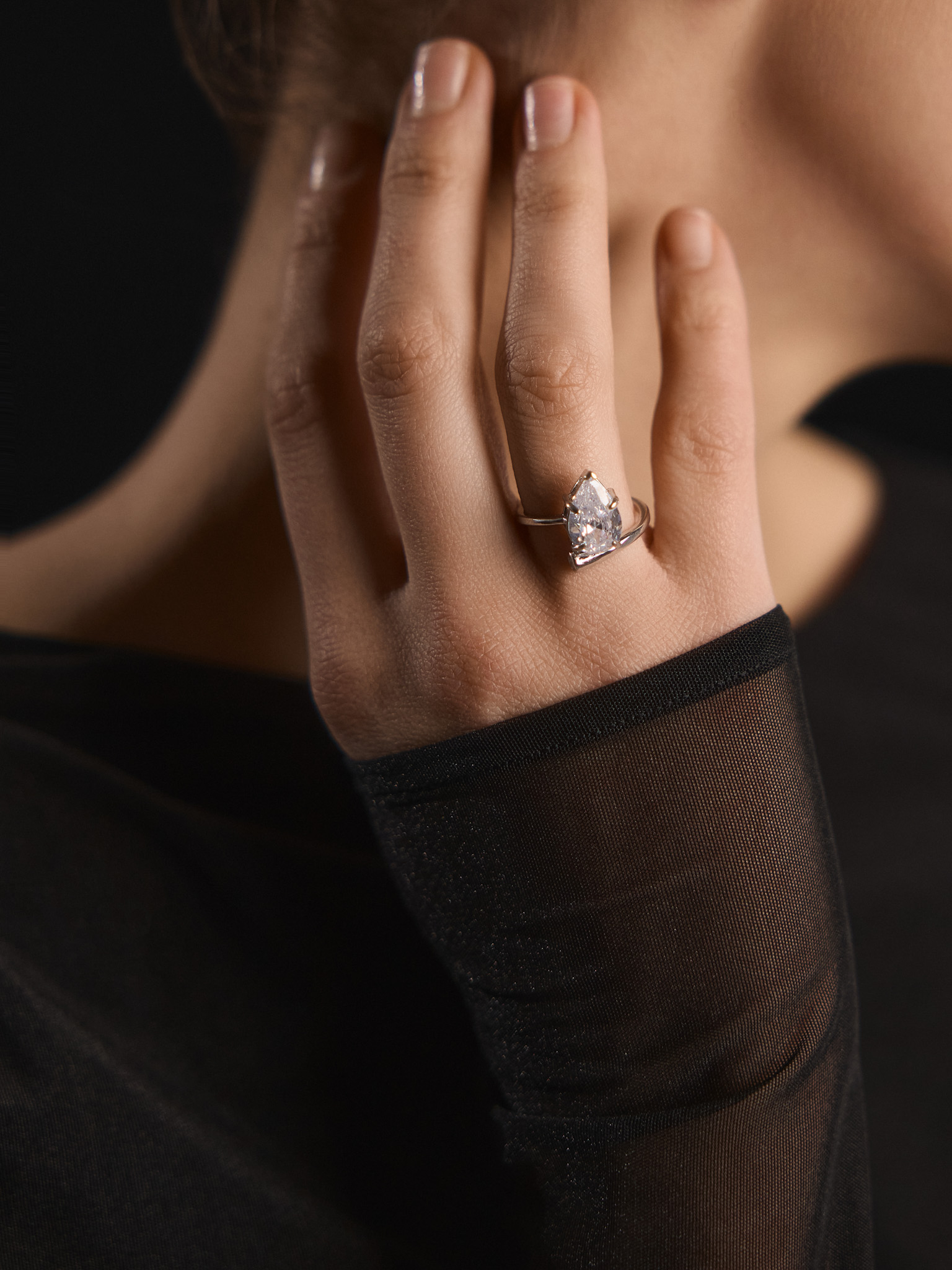 Slim ring with large teardrop-shaped stone