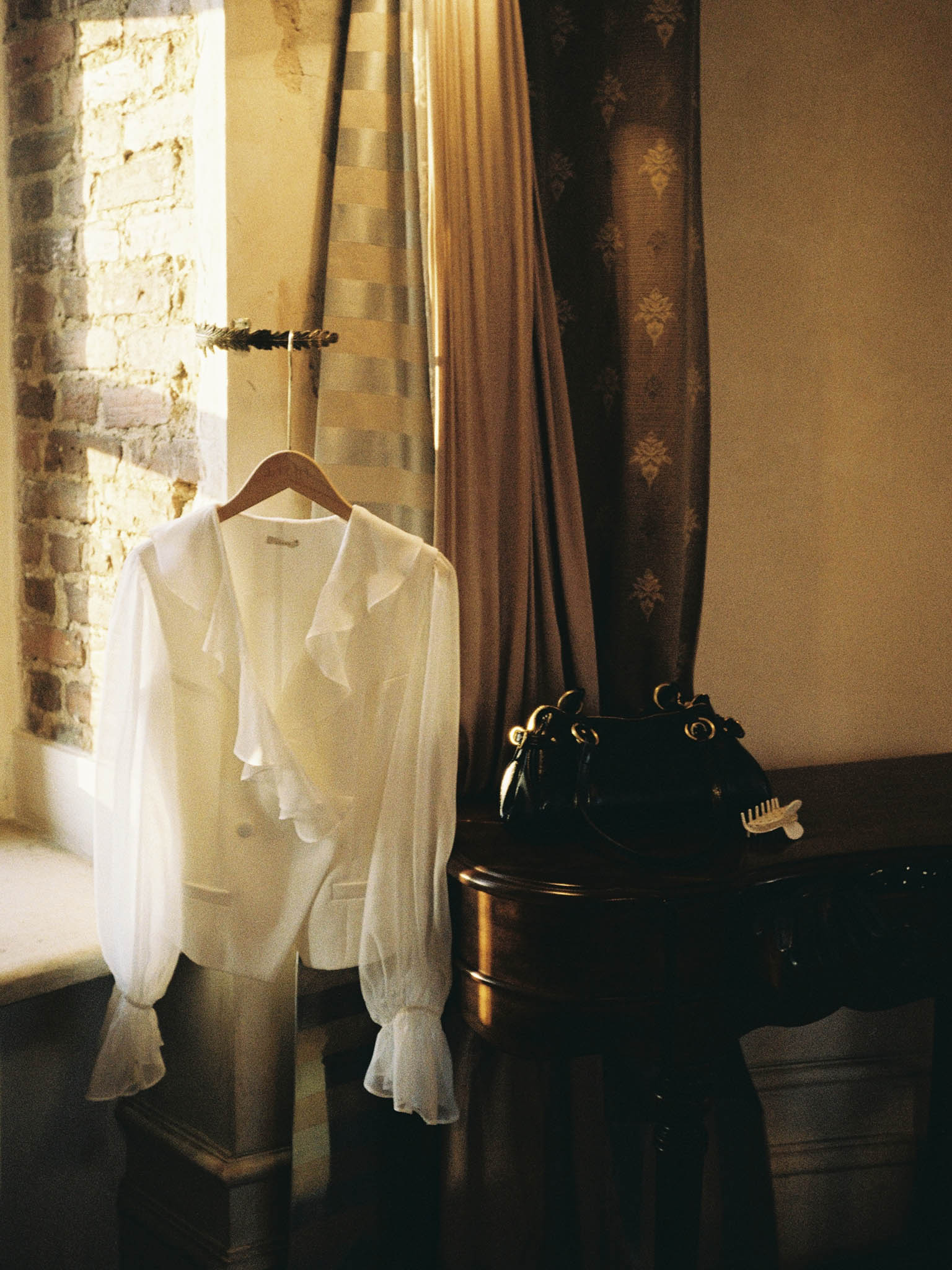 Wrap blouse with sheer sleeves