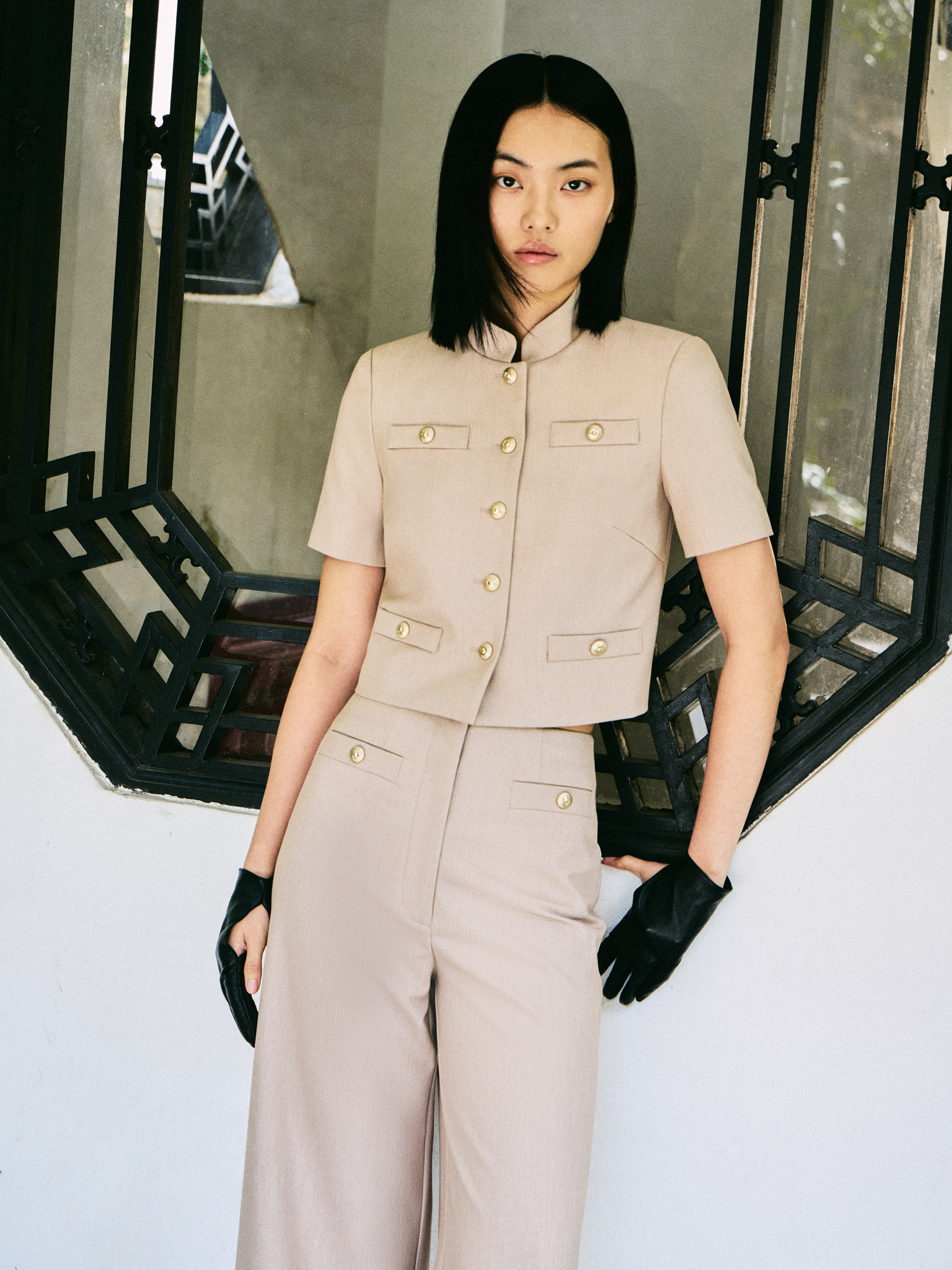 Jacket with short sleeves and oversized buttons