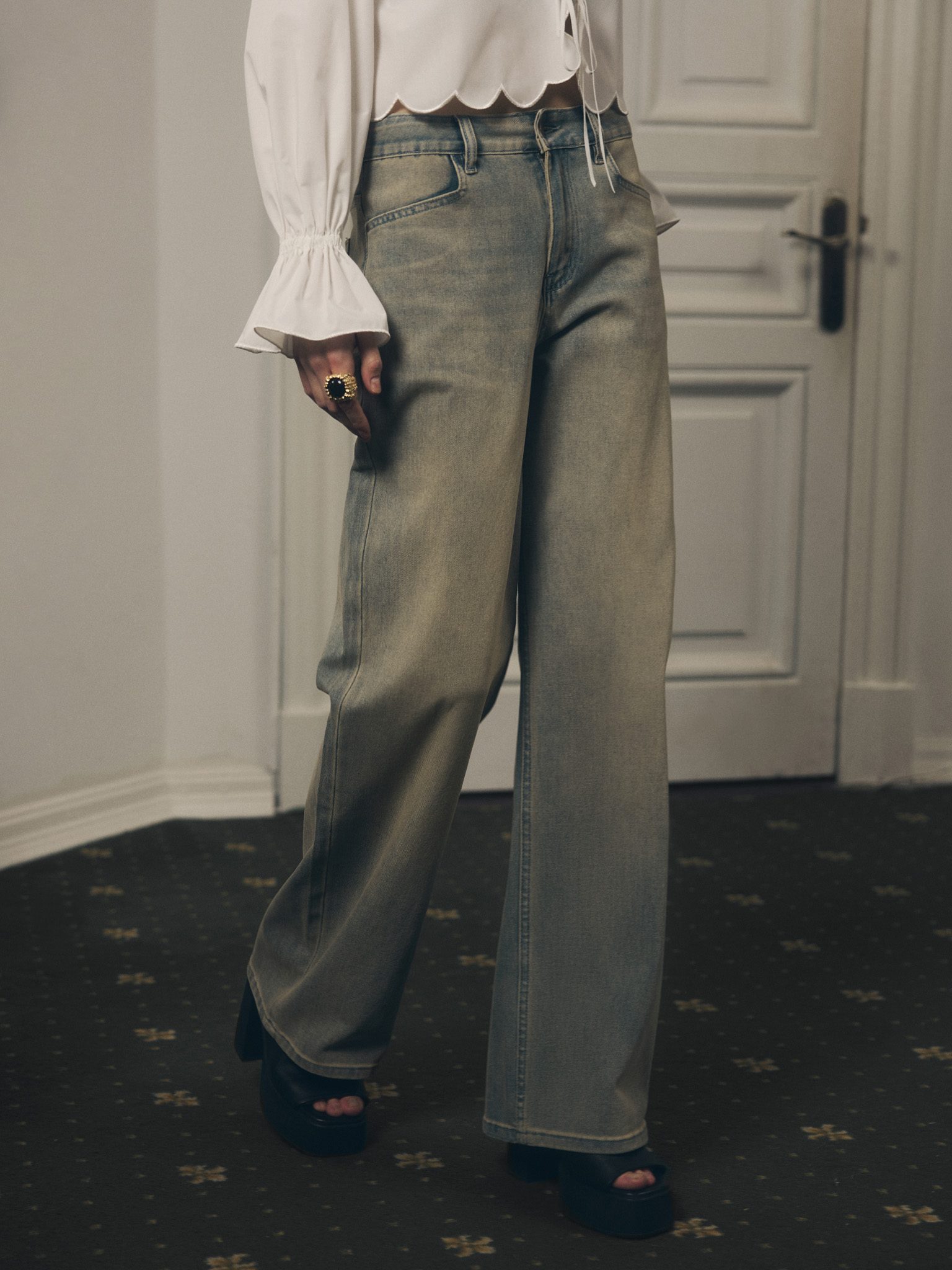 Loose light-wash denim jeans