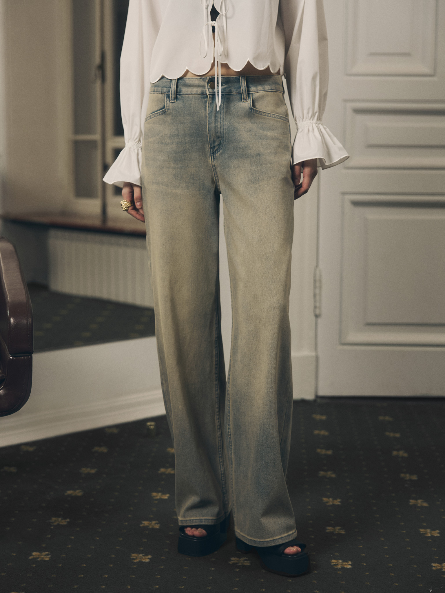 Loose light-wash denim jeans