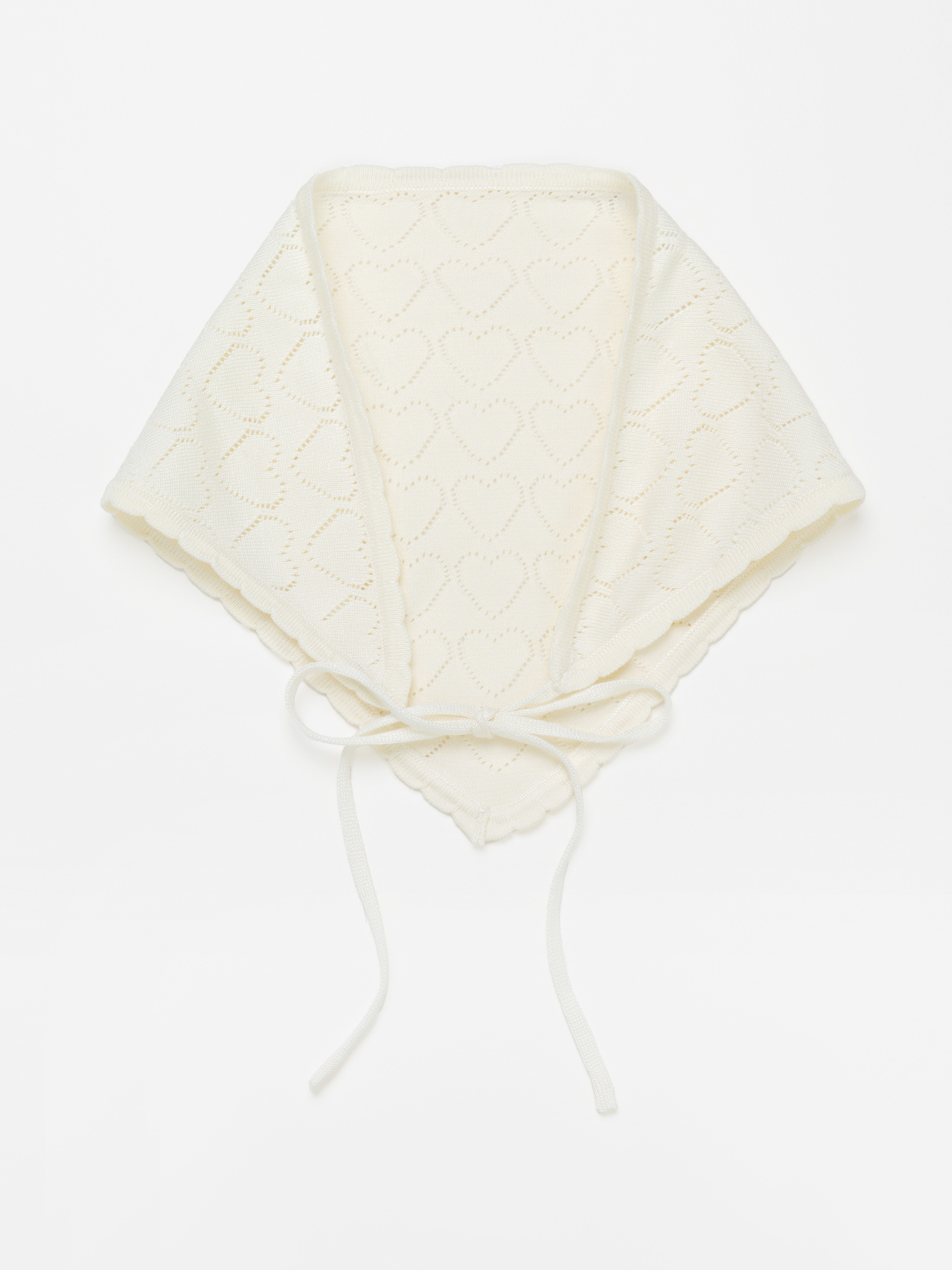 Knitted shawl with ornamental pattern