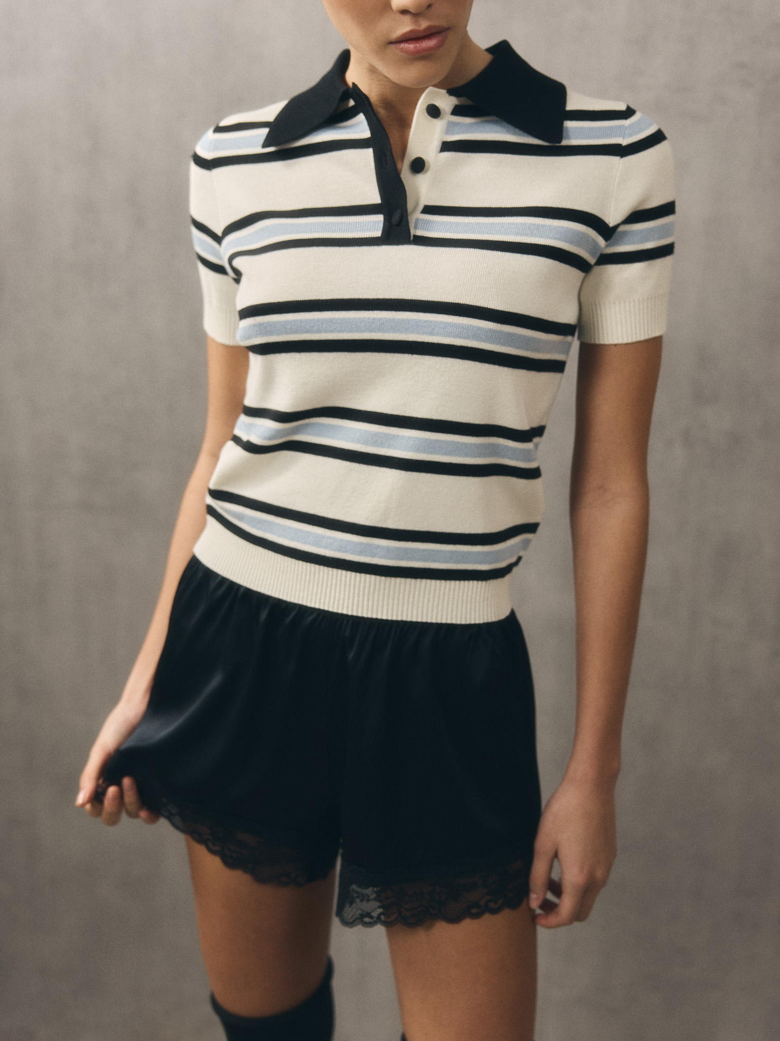 Striped polo shirt with short sleeves and contrasting collar