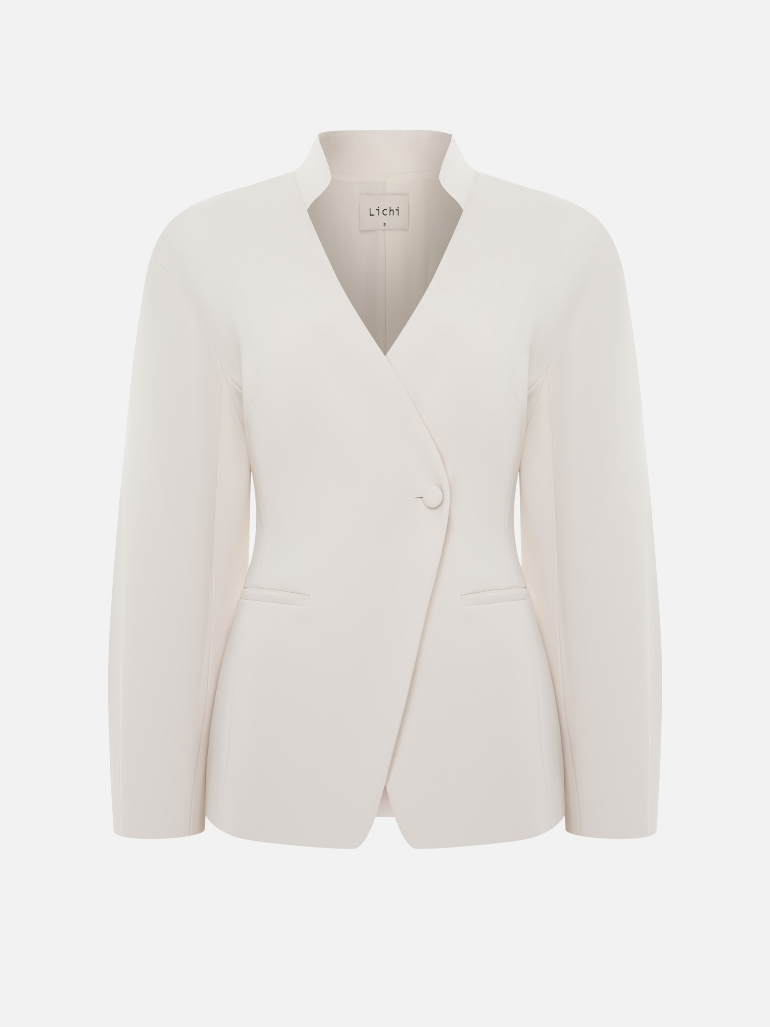 Fitted jacket with a covered button