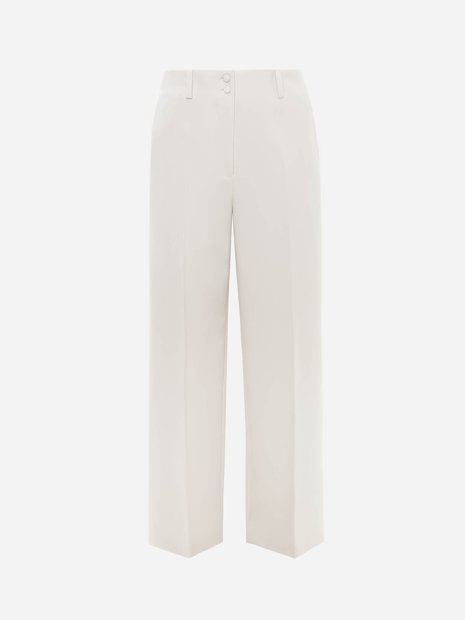 Loose trousers with covered buttons