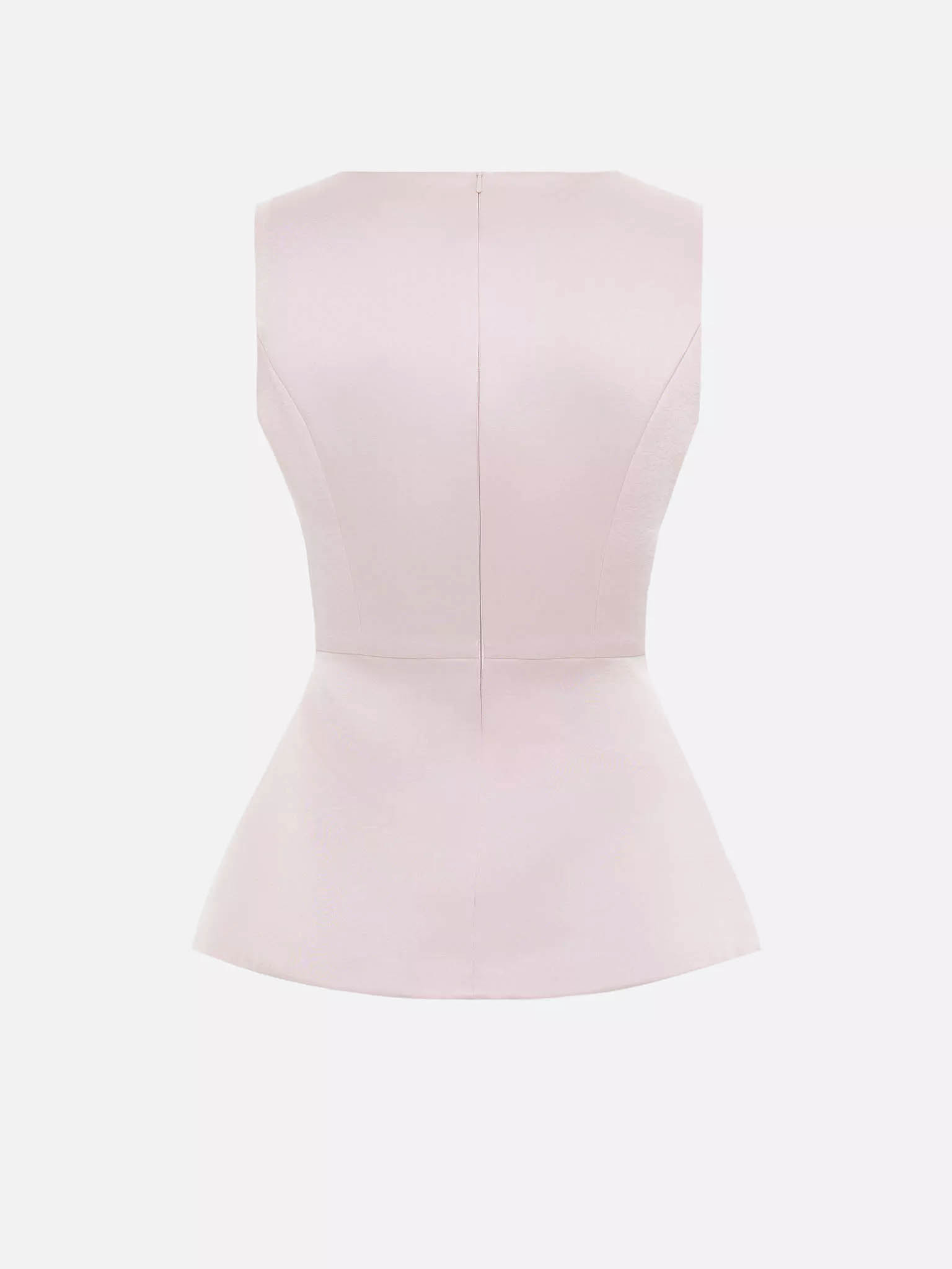 Haut ajusté à la coupe sophistiquée, avec un volant à la taille