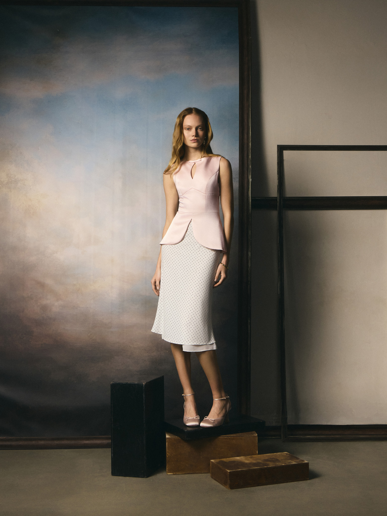 Taillierte Bluse mit komplexem Schnitt und Schößchen