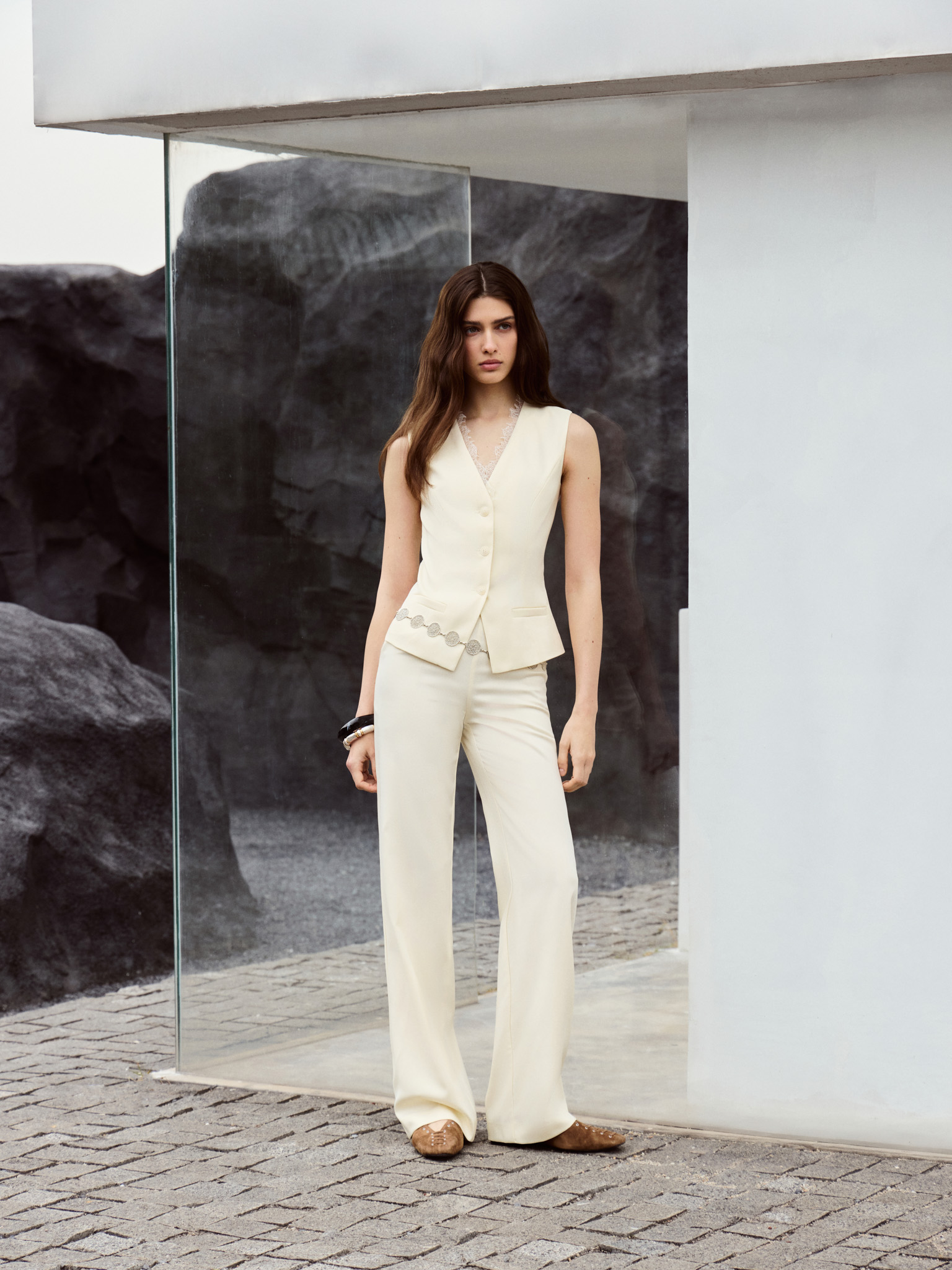 Flared trousers in suiting fabric with lace decor