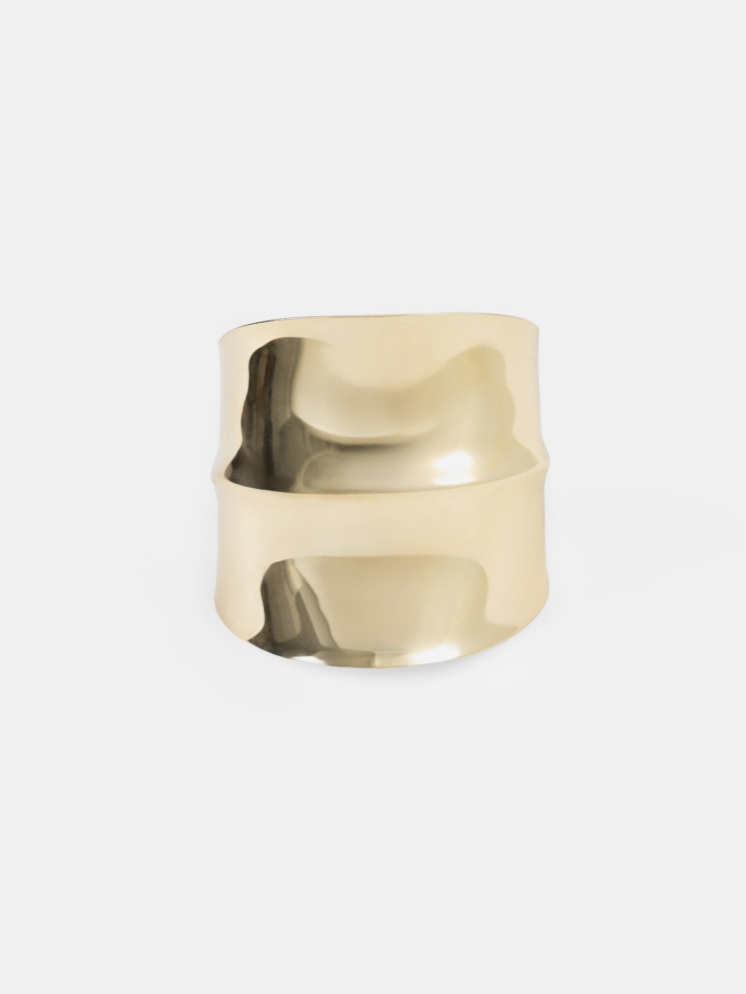 Wide curved metal bracelet